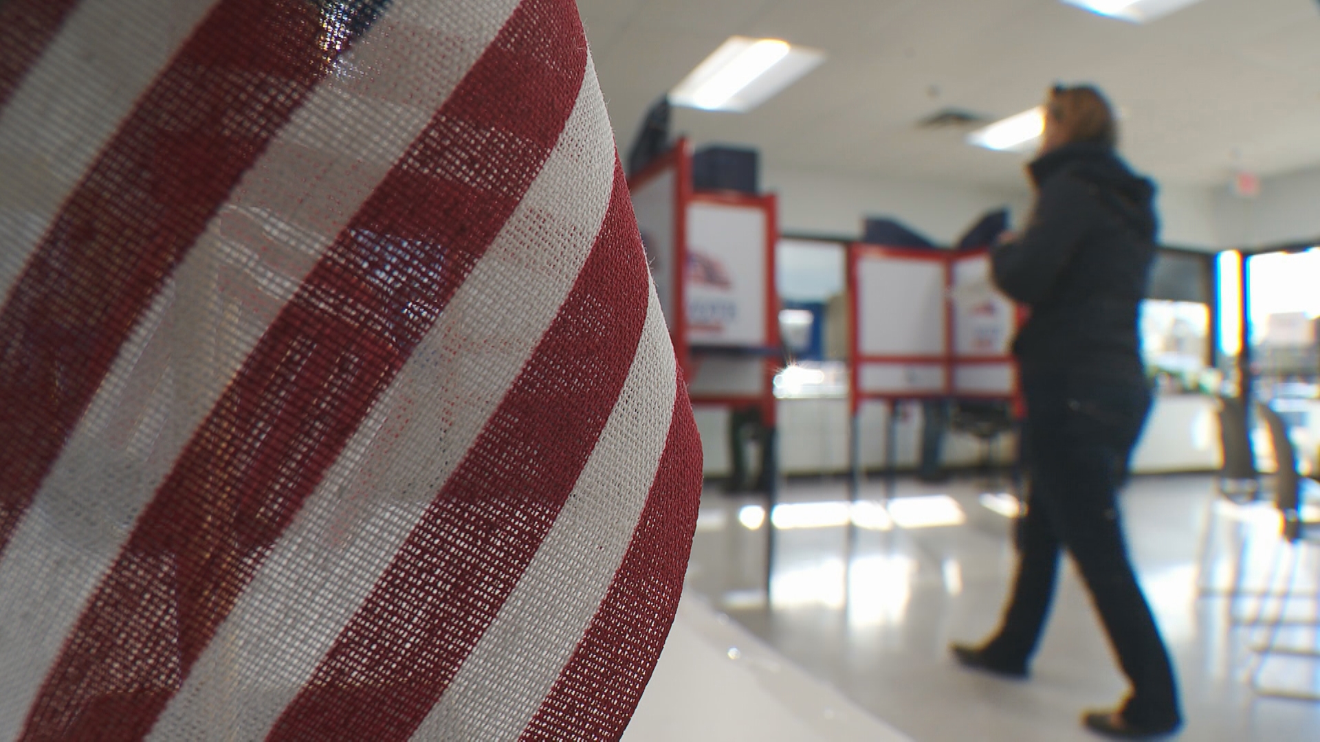 During a one-day, pop-up early voting event in Minneapolis on Tuesday, Ia Lee was on hand to help voters whose first language is Hmong. 