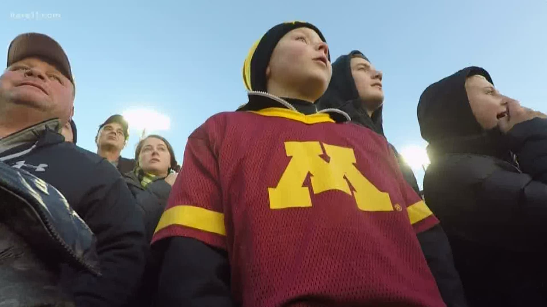 There was a very good reason 9-year-old Emmett Lahr stood in the stands of Kinnick Stadium wearing a Gopher jersey with his Hawkeye hat.