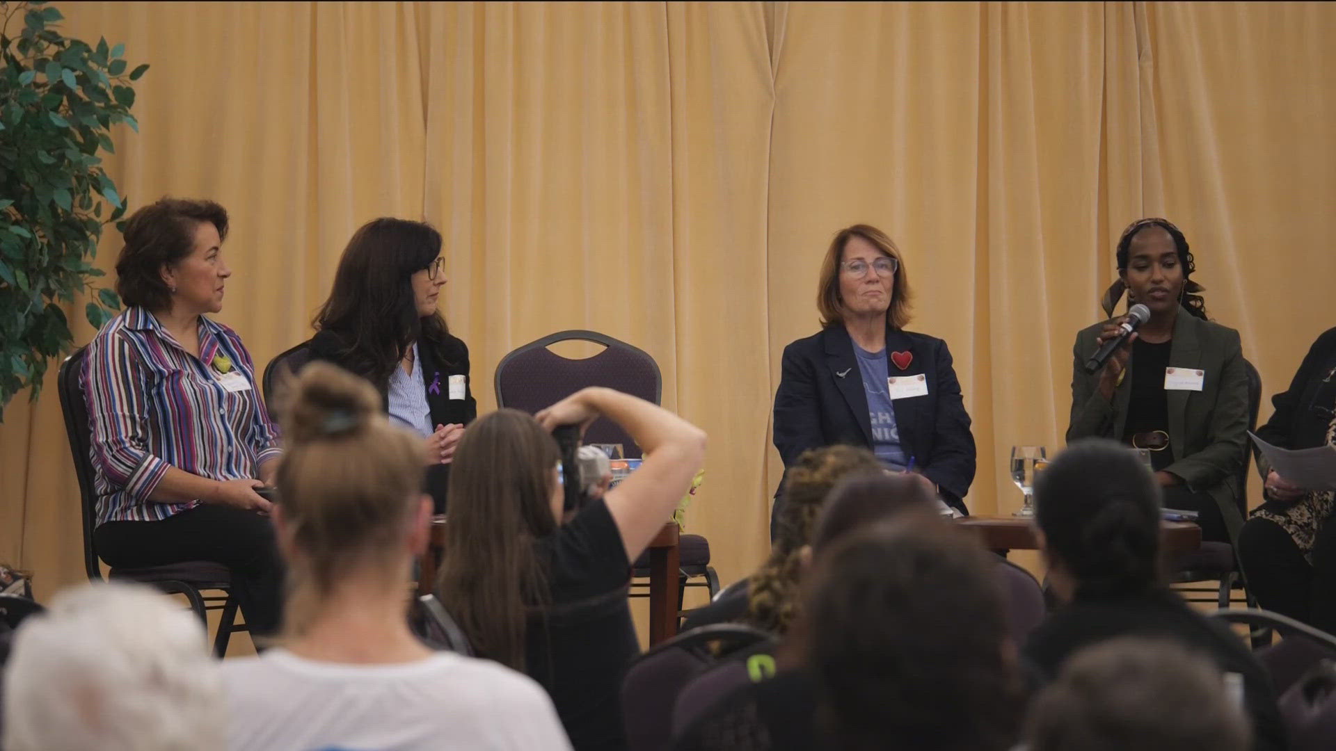 The discussion took place inside the Rauenhorst Ballroom at Saint Catherine University on Tuesday.