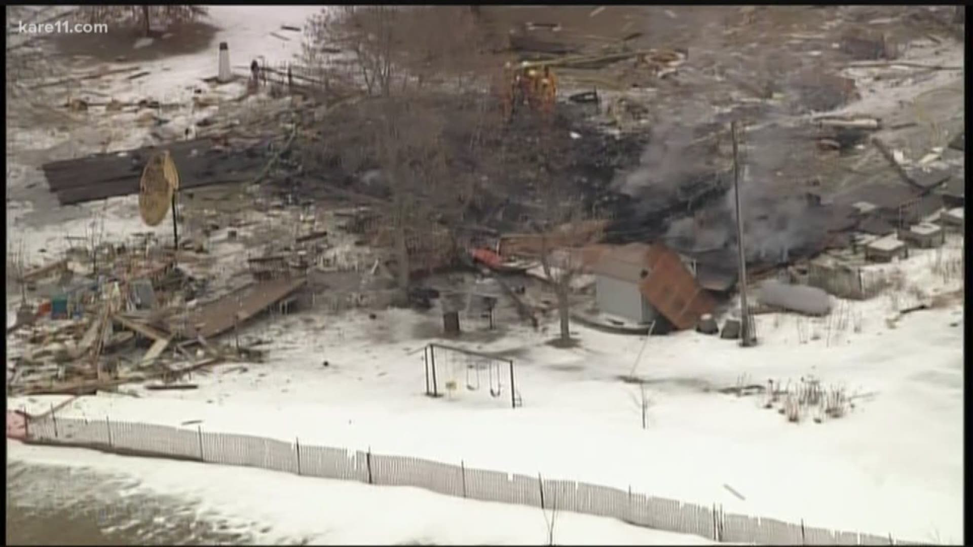 Sheriff's officials say one person is dead and another is severely burned after a house explosion in Dakota County early Tuesday morning.