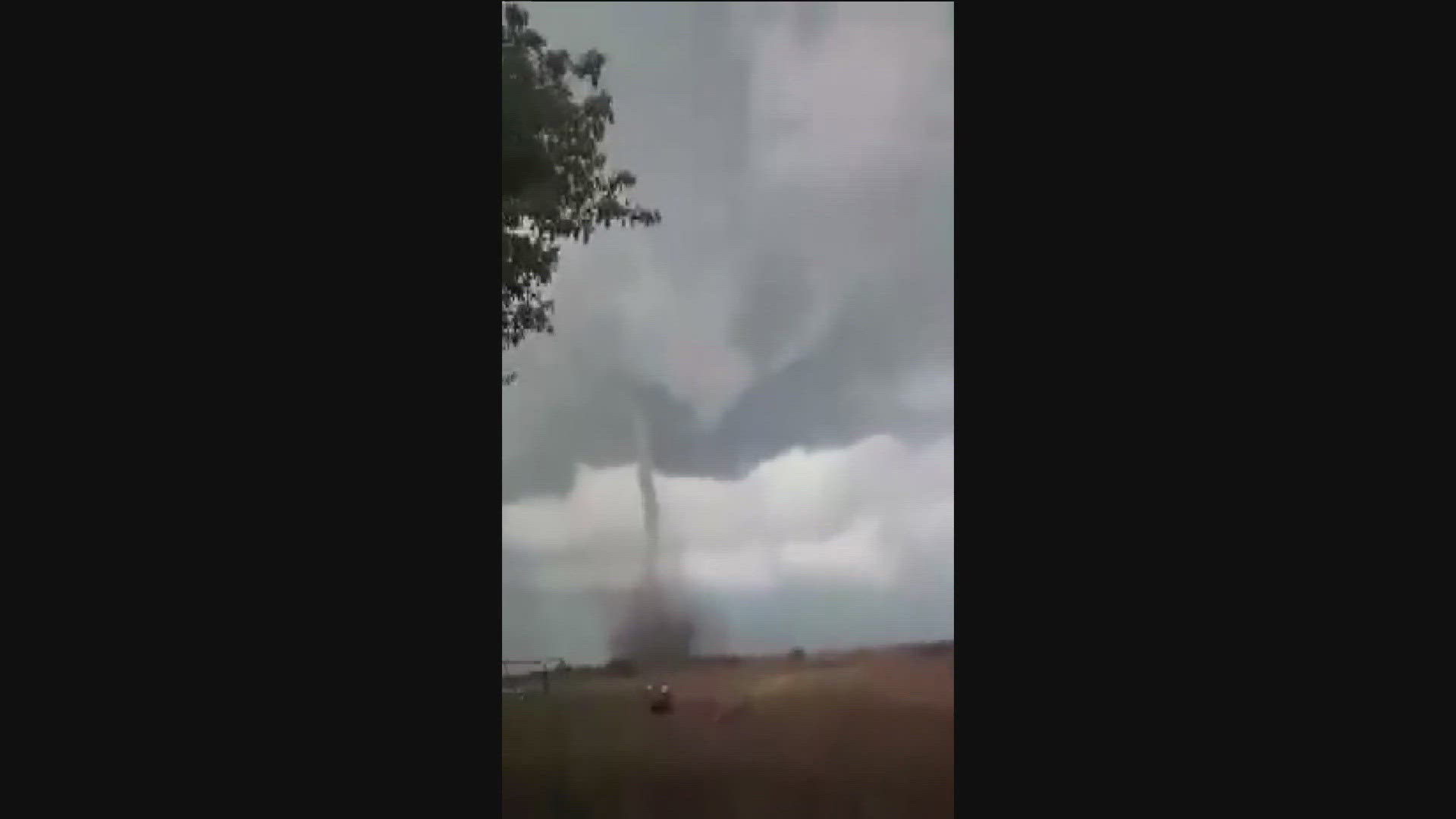 A tornado caught on camera tore across fields in New Richmond, Wisconsin, leaving behind a path of destruction. 
