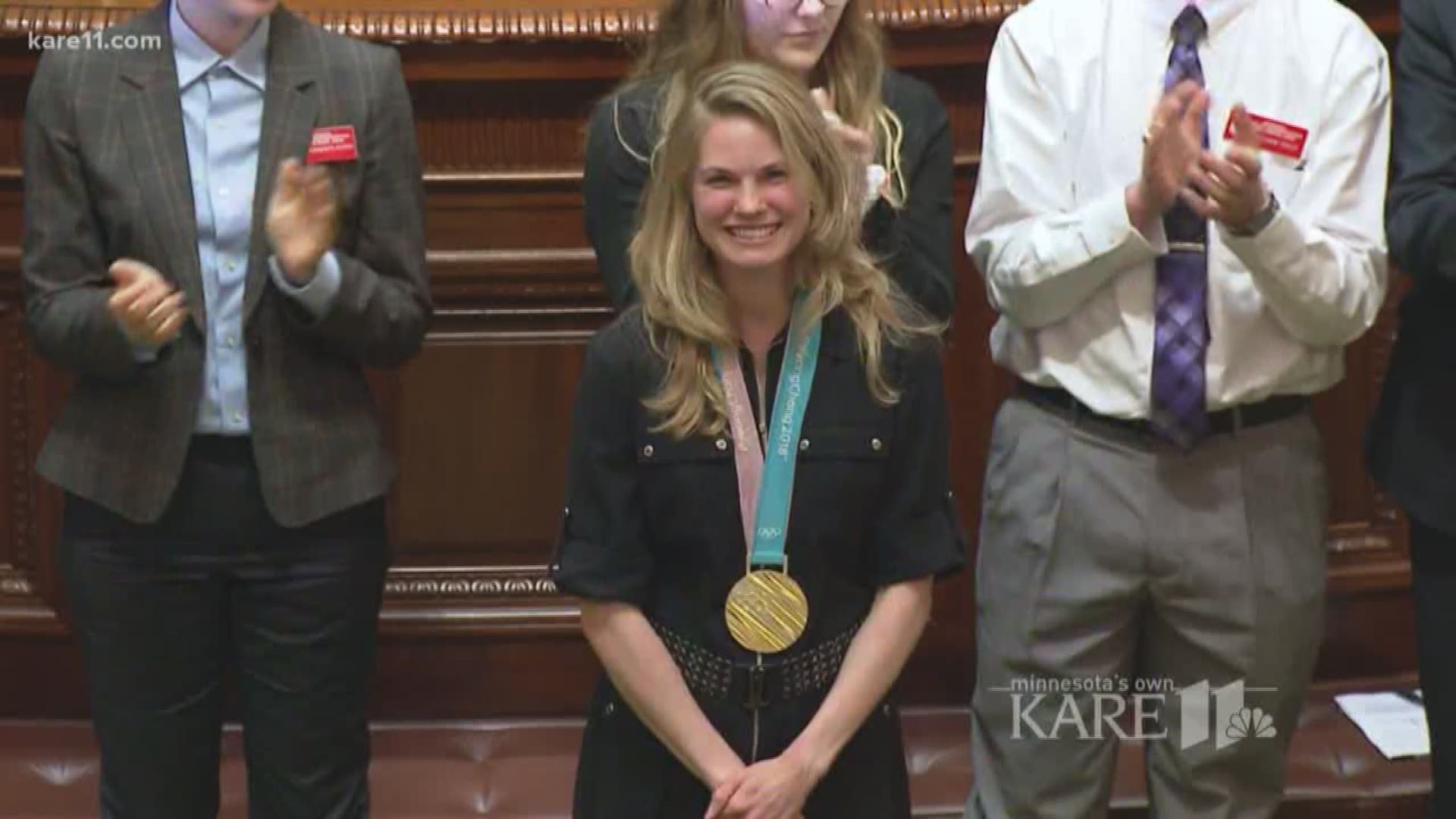 The gold medalist got a warm welcome home at the state capitol where she started her push to bring a big race to Minnesota.