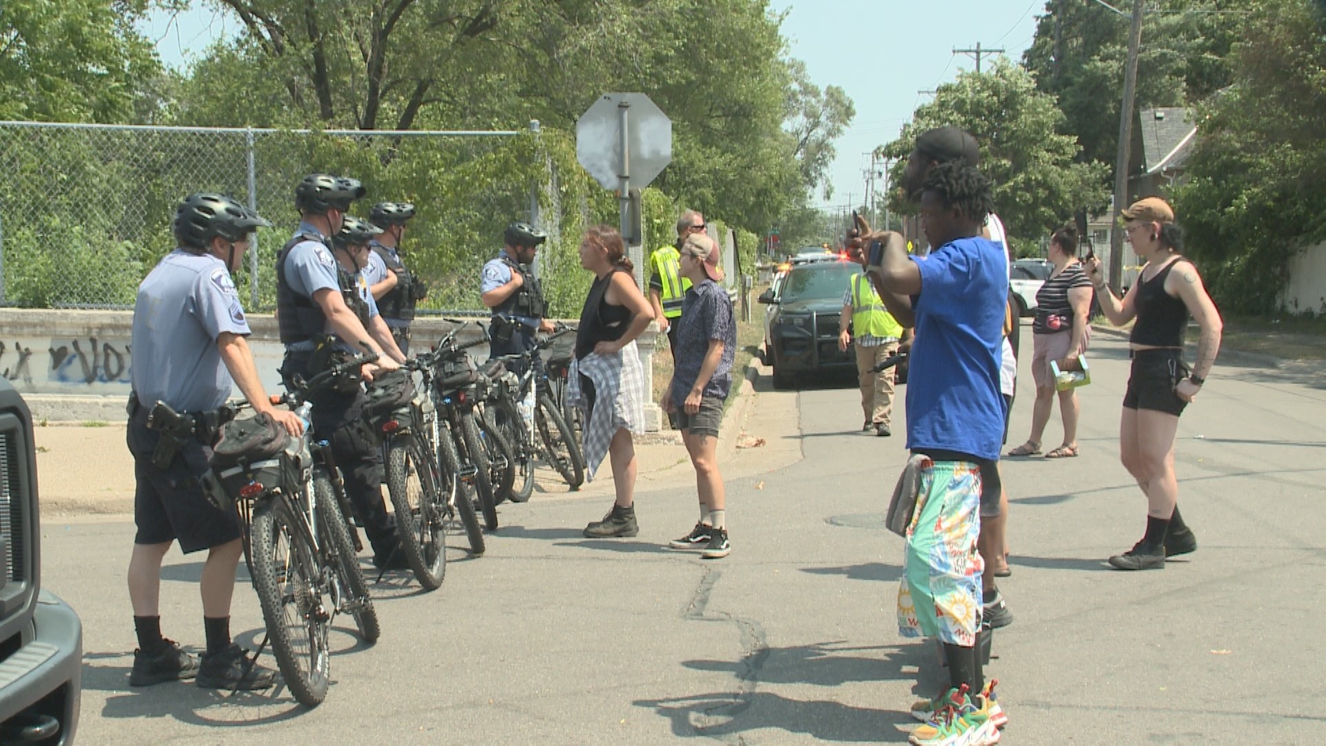 Minneapolis firefighters were called to a house fire around 4:00 a.m. Wednesday. Around 1:00 p.m., a homeless encampment in the same neighborhood was cleared out.