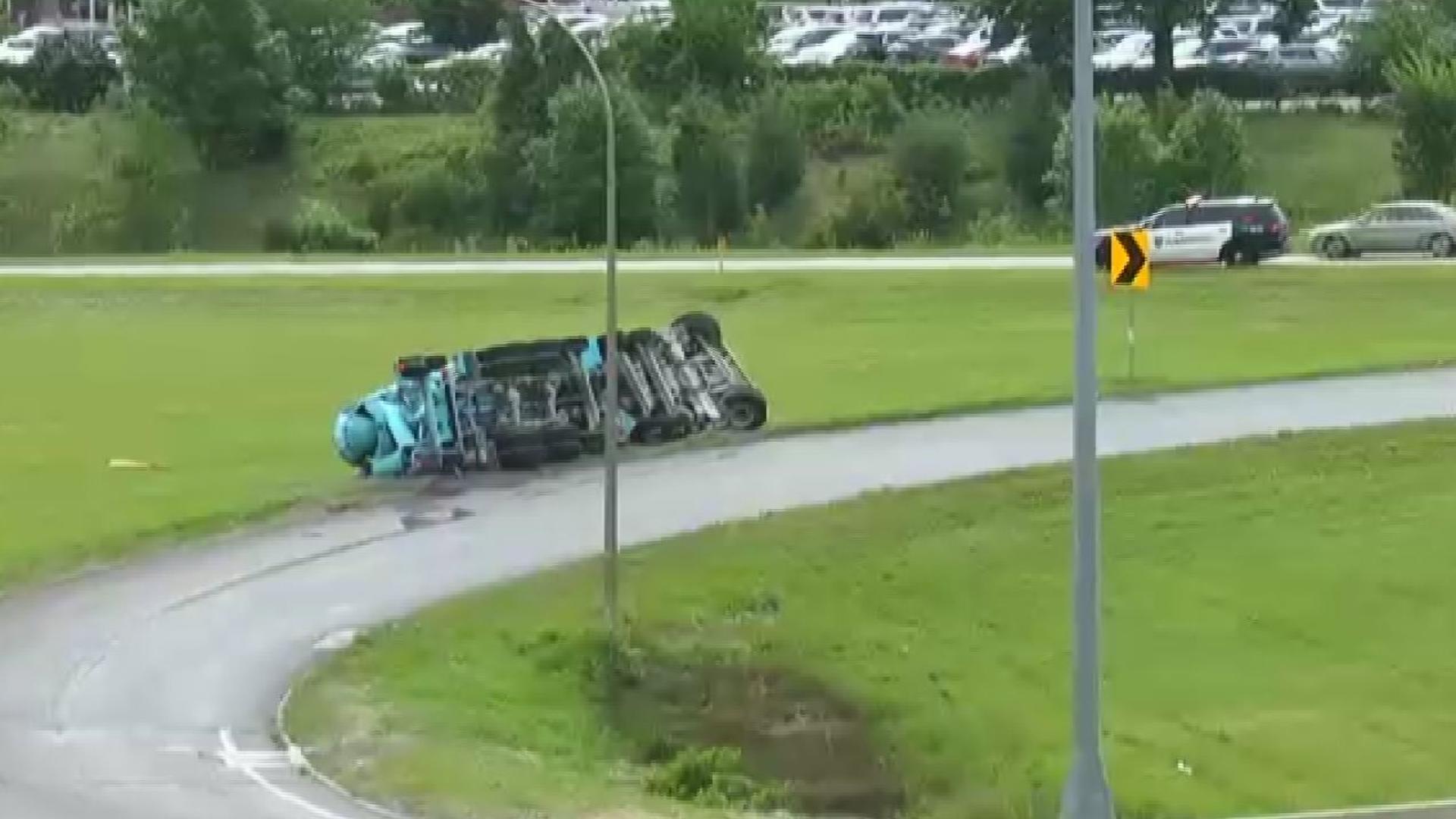 The State Patrol says the driver of a cement truck was navigating the off-ramp from eastbound Highway 36 to Snelling Ave. when he rolled off the pavement.