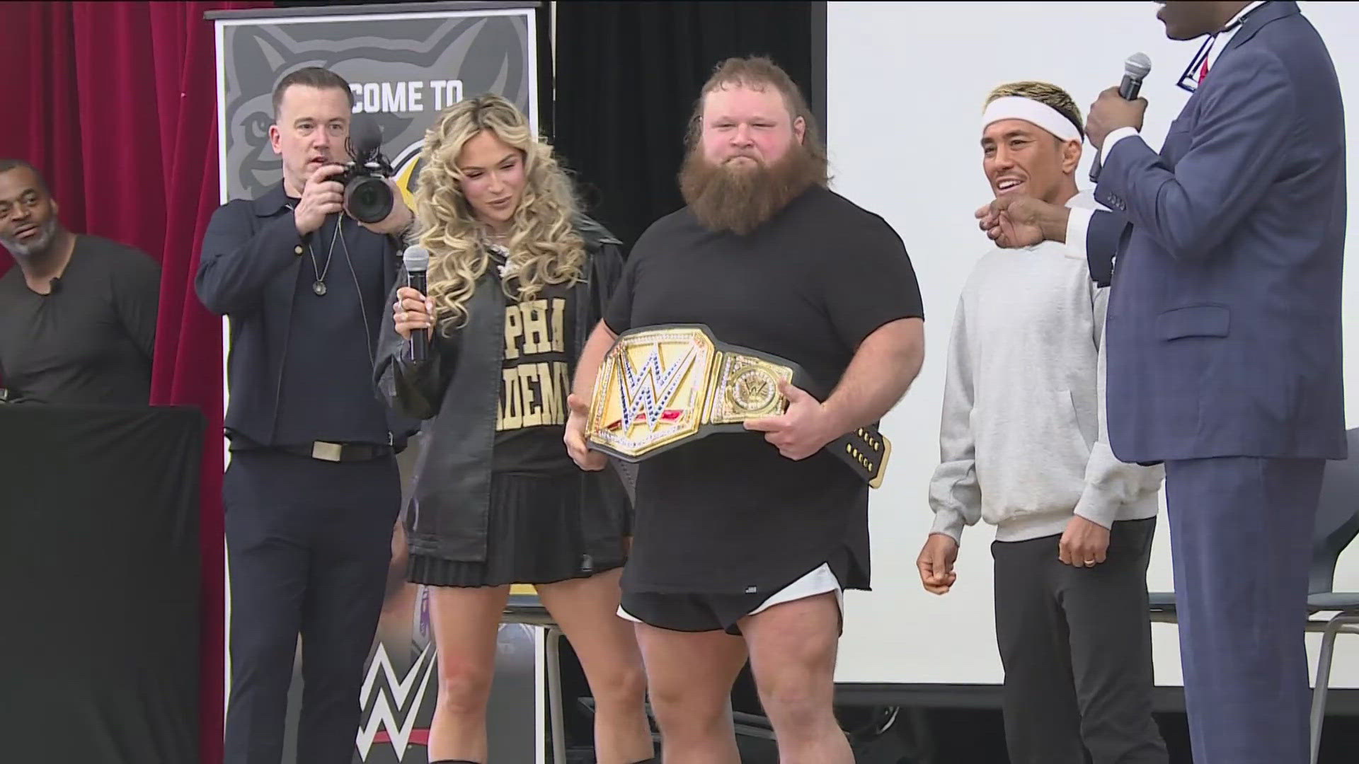 WWE wrestlers, who are in town for Monday Night Raw at the Target Center, spent some time at Olson Middle School in Minneapolis Monday morning.