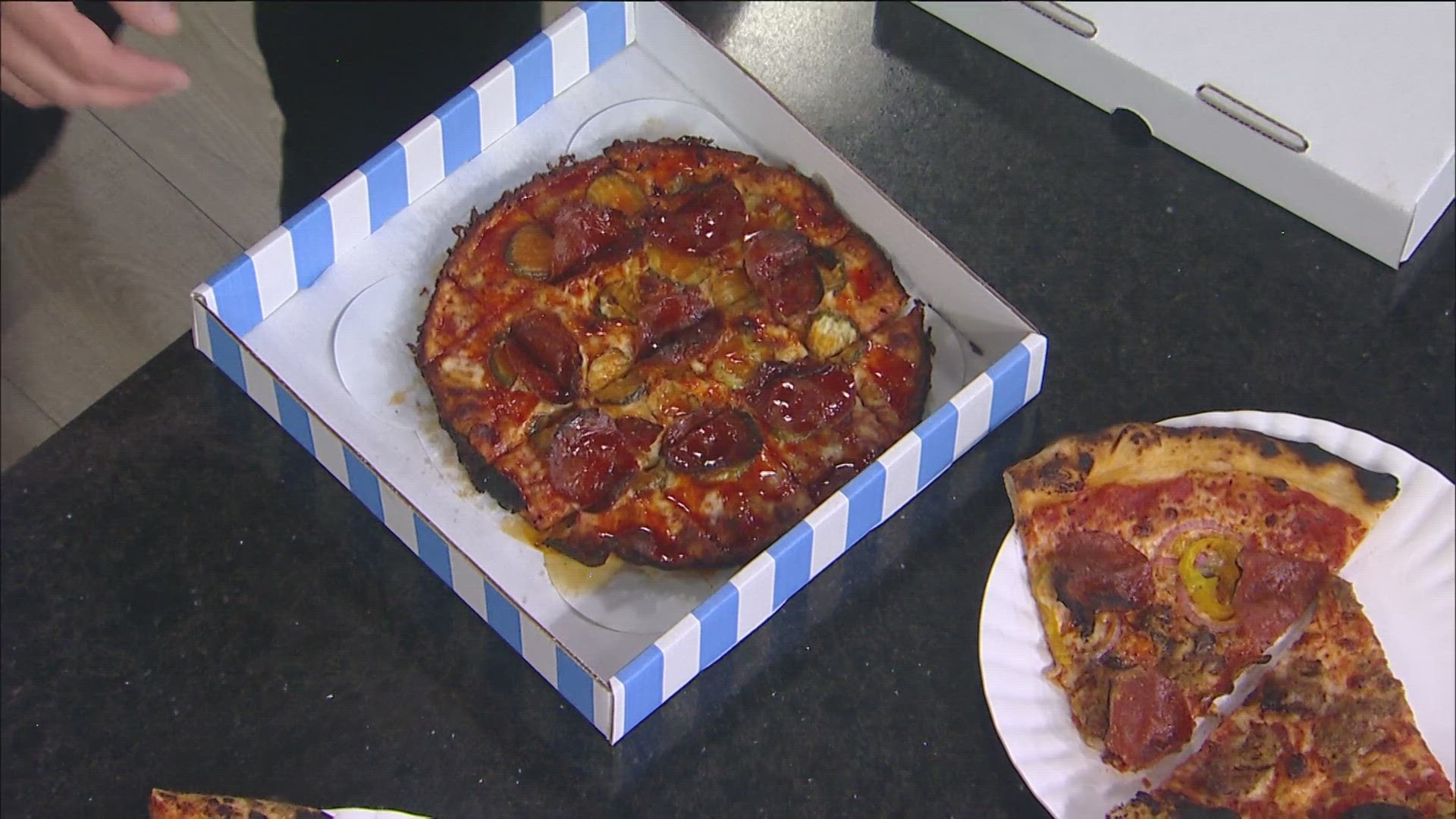 The locally-owned restaurant is also offering its pizza by the slice.