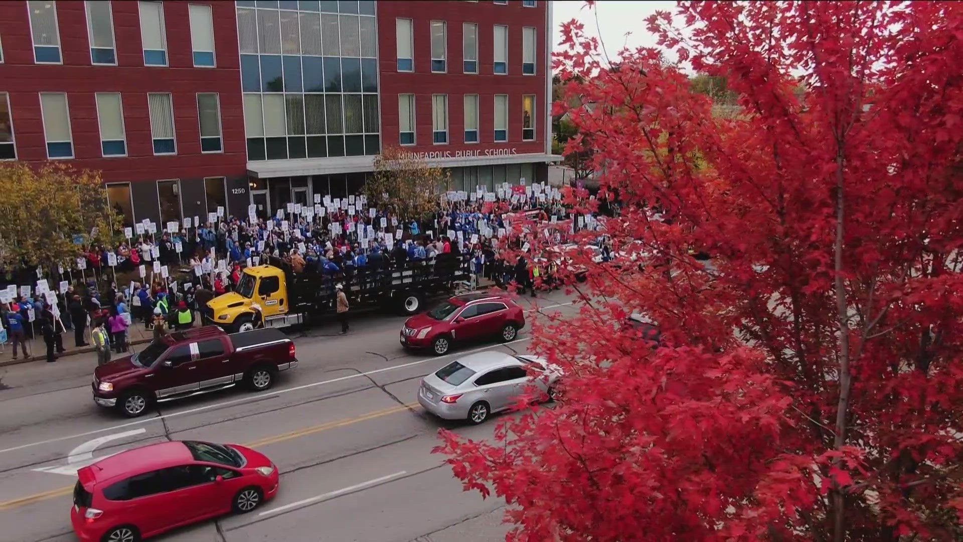 On Tuesday, educators rallied outside district offices after overwhelmingly approving a vote to strike. 