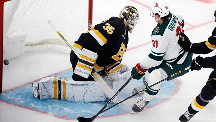 Taylor Hall scores in overtime as Bruins beat Wild 4-3