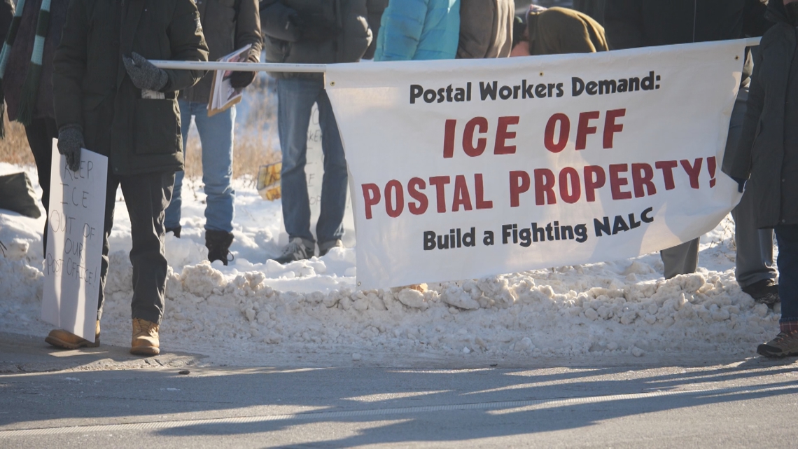 Postal workers rally in Minneapolis against ICE raids