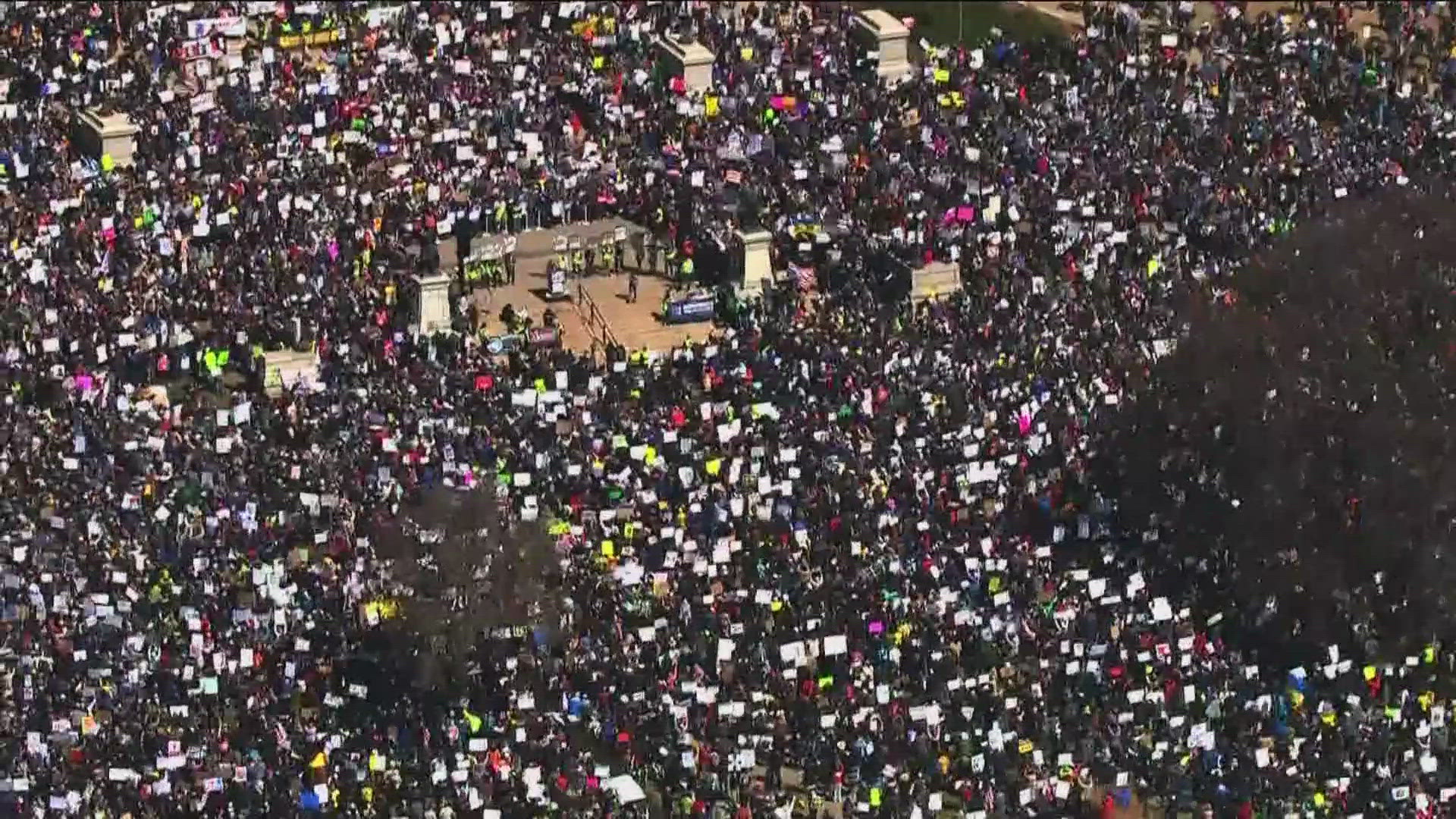 Large crowds gathered at the State Capitol on Saturday to protest the Trump administration. 