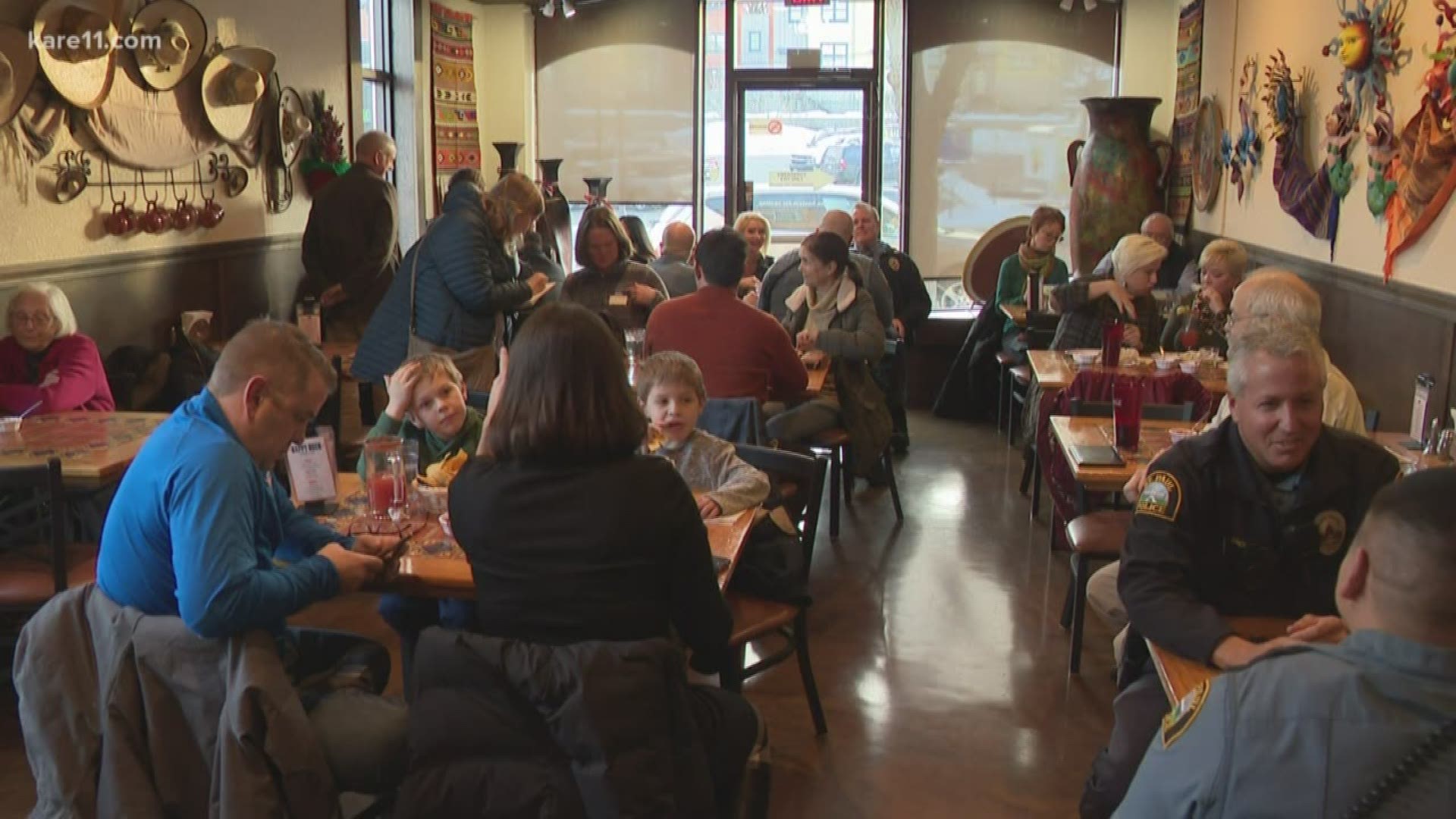 Several hundred packed a beloved St. Paul restaurant tonight in the aftermath of a scary armed robbery.