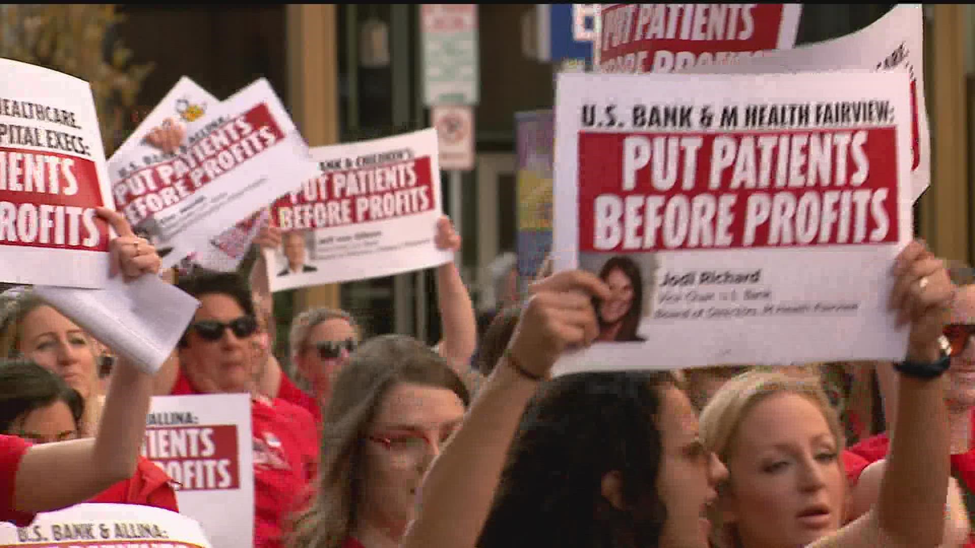 After making remarks outside U.S. Bancorp Center, hundreds of nurses went into the building, then marched to Wells Fargo.