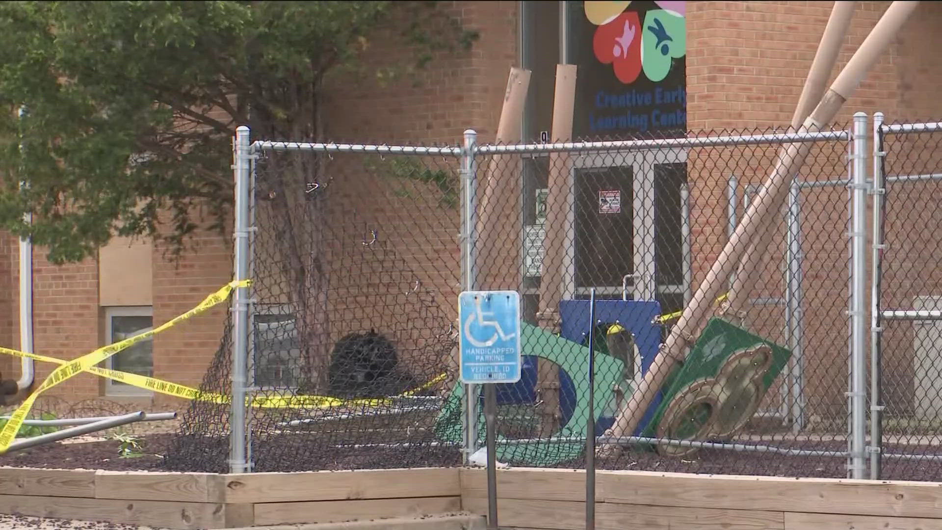 Video shows some playground equipment crushed and the bus's front end heavily damaged.