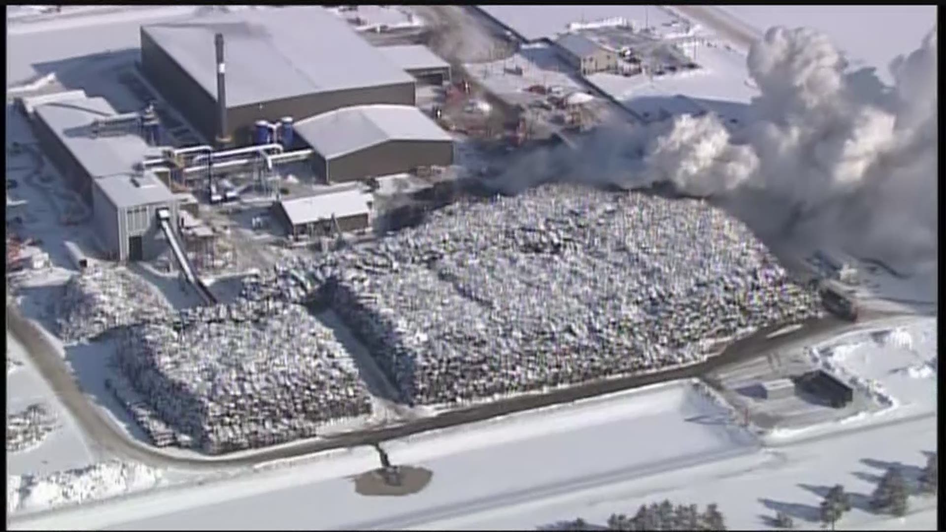 SKY 11 footage shows aerial view of crews fighting a fire that started in a pile of "crushed up vehicles" at Northern Metals Recycling Plant in Becker, Minnesota.