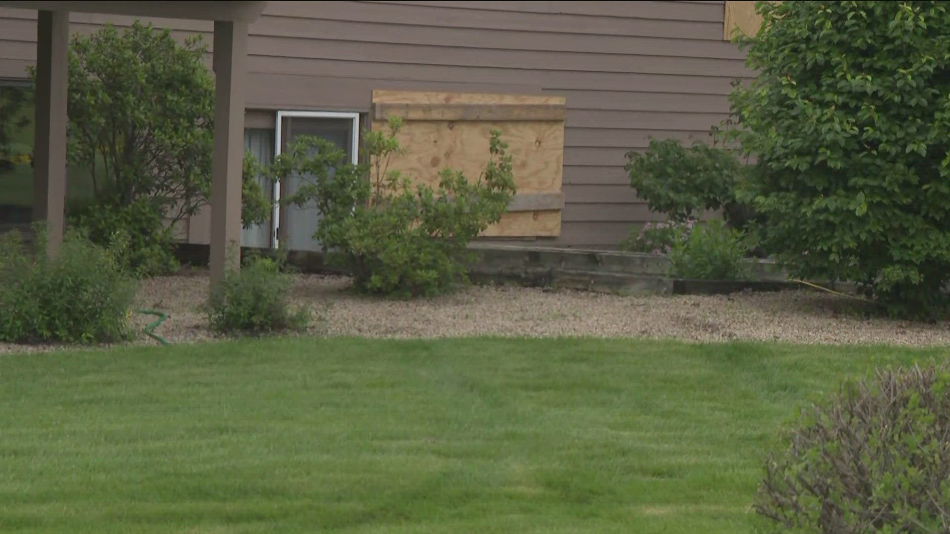 Brooklyn Park investigators say someone pried plywood off a window in the rear of the home and rummaged around inside. 