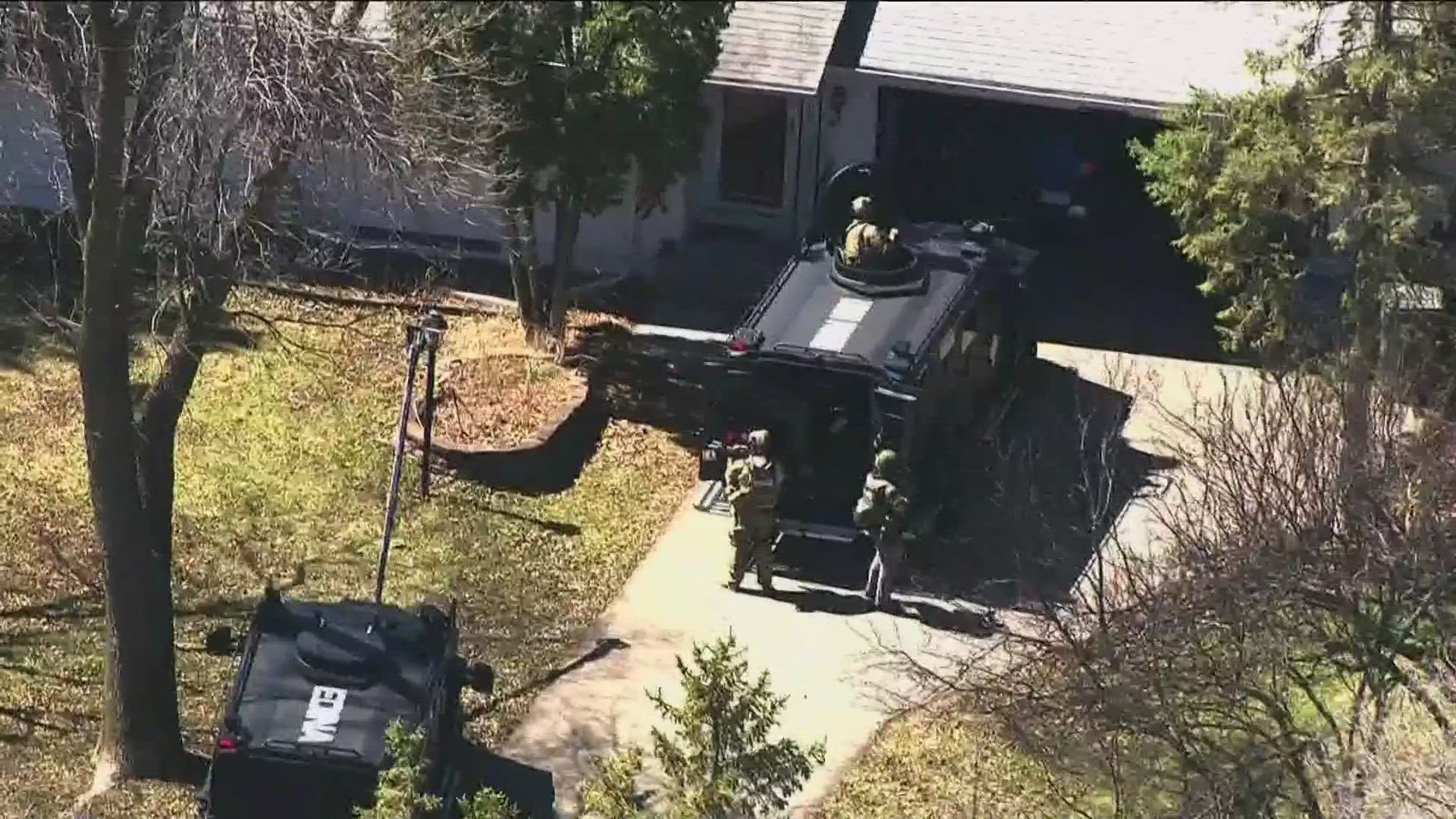 The deputies, who suffered non-life-threatening injuries, were serving a warrant at a home in the 13000 block of East Crestwood Drive in Minnetonka.