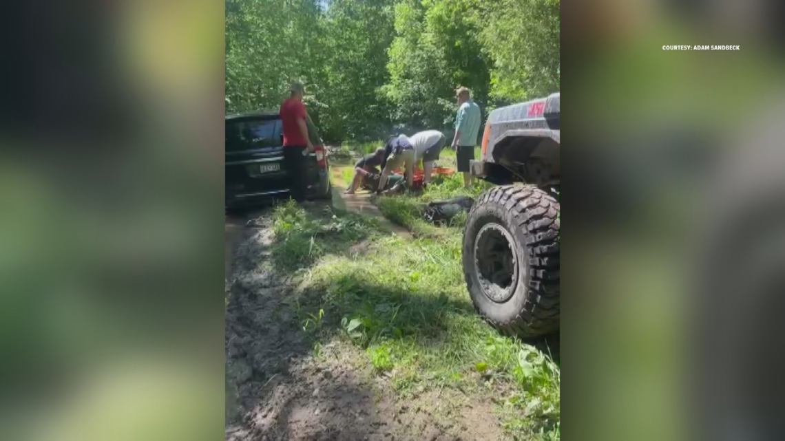 Two men describe discovering woman trapped in mud by remote Minnesota trail for three days