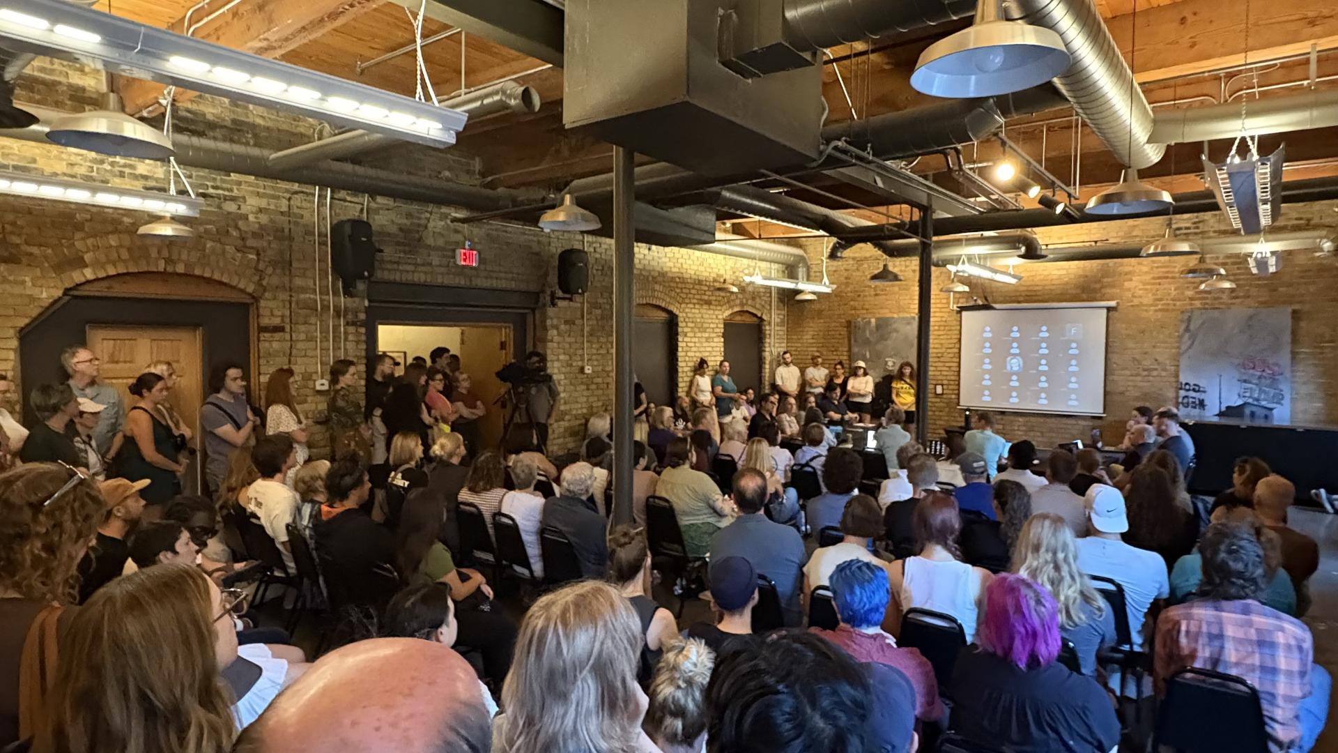 People pack a North Loop Neighborhood Association meeting over proposed ...