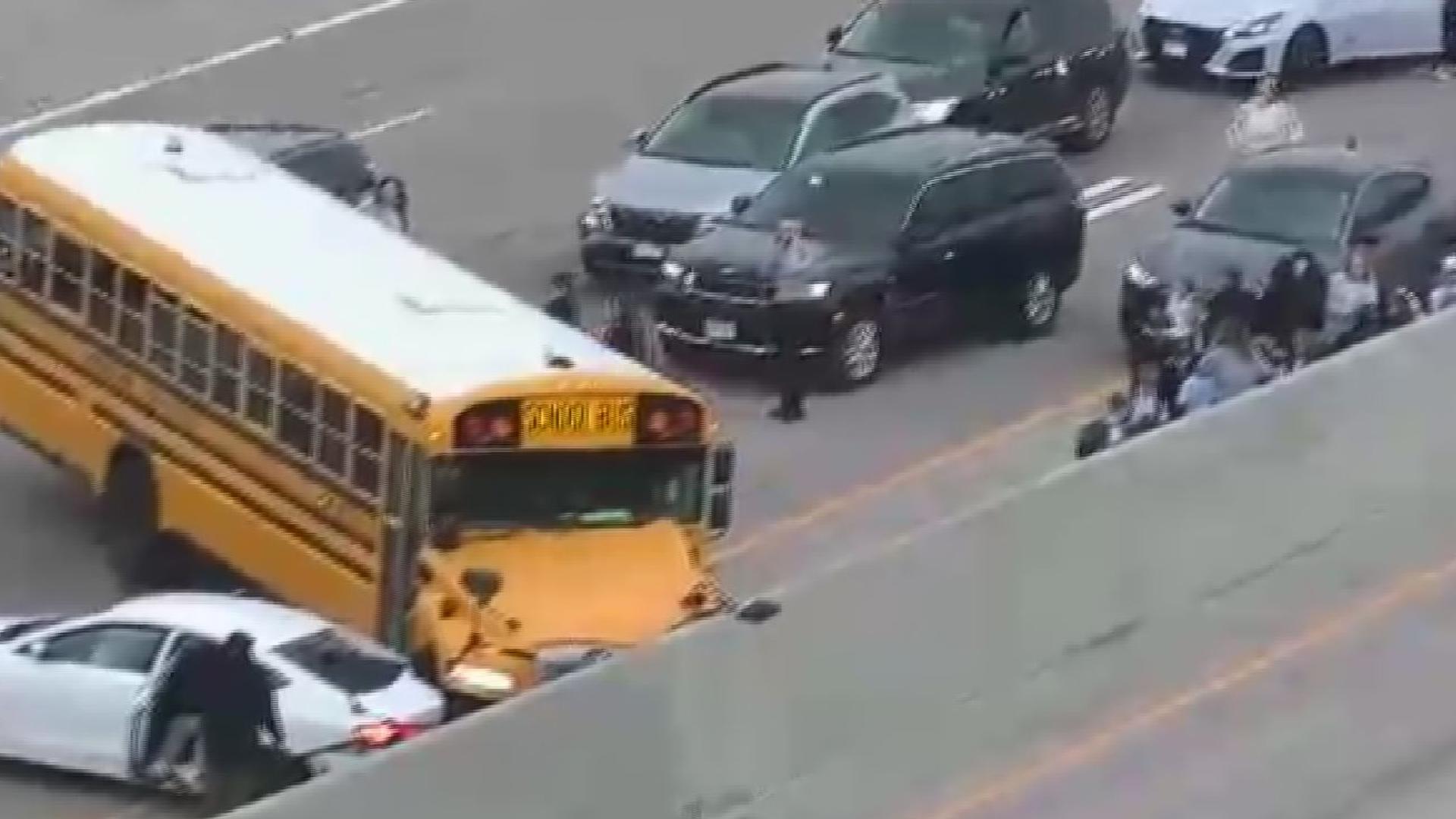 A driver attempting to change lanes struck a school bus filled with children on I-35W in Mounds View Tuesday.