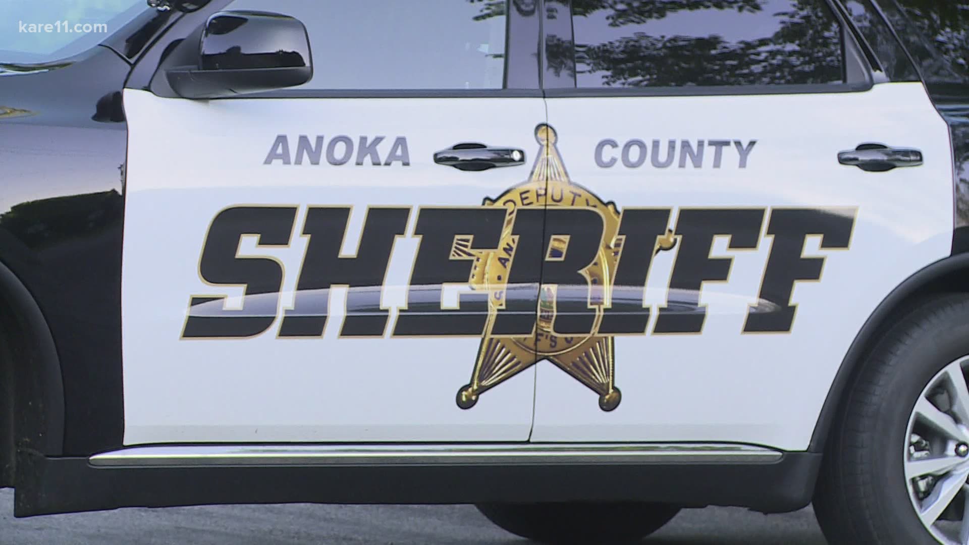 The Anoka County Sheriff's Office says deputies used a smoke canister and tear gas after some people in a group of about 200 refused to leave.