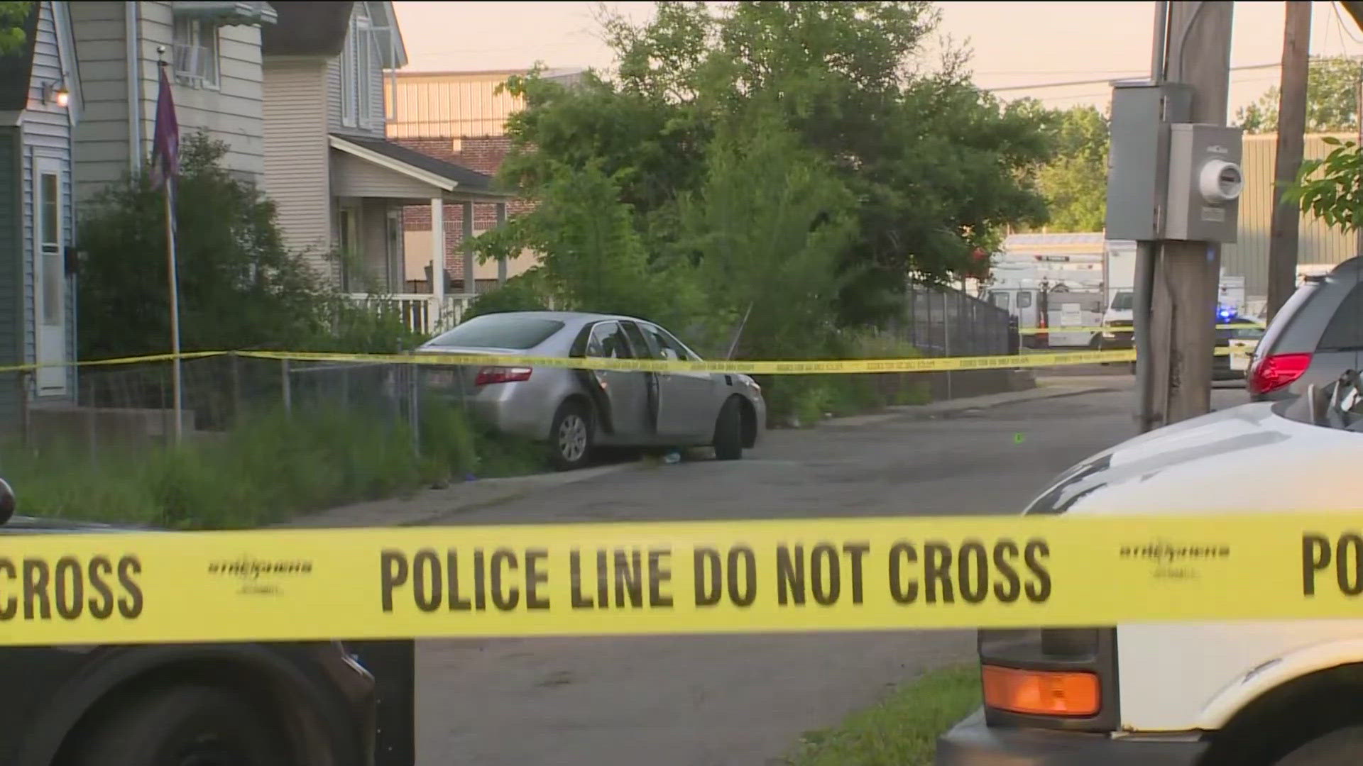 Police have a section of Simcoe Street blocked off and officers are investigating a car.