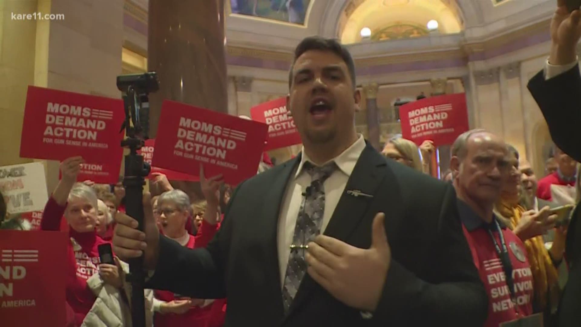 Gun control supporters lined the entrance to the House chamber on opening day of the 2019 session. Their top objectives are universal background checks and a bill that would temporarily remove firearms from people in a mental health crisis.