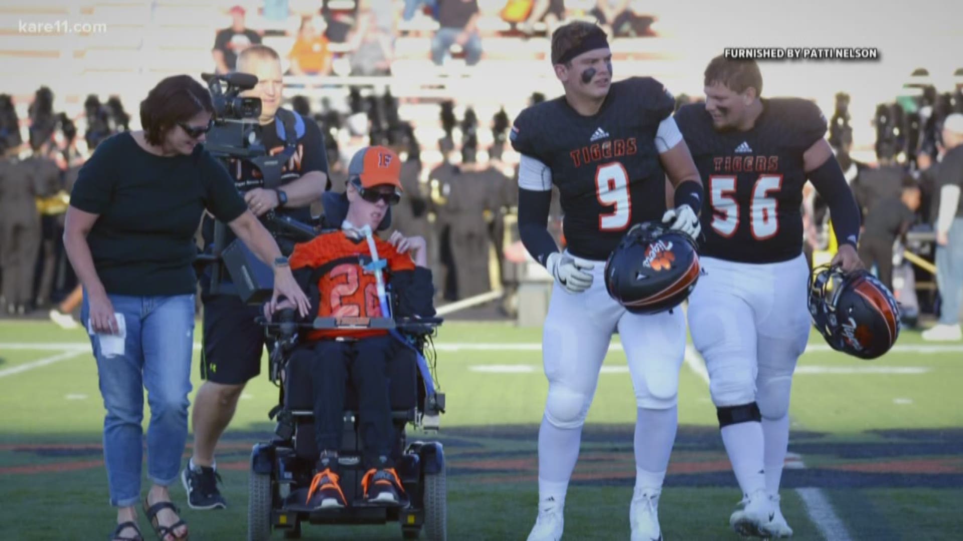 Andy Welter loves football, but has never played a down due to myotubular myopathy. Farmington HS Football made him feel like part of the team.