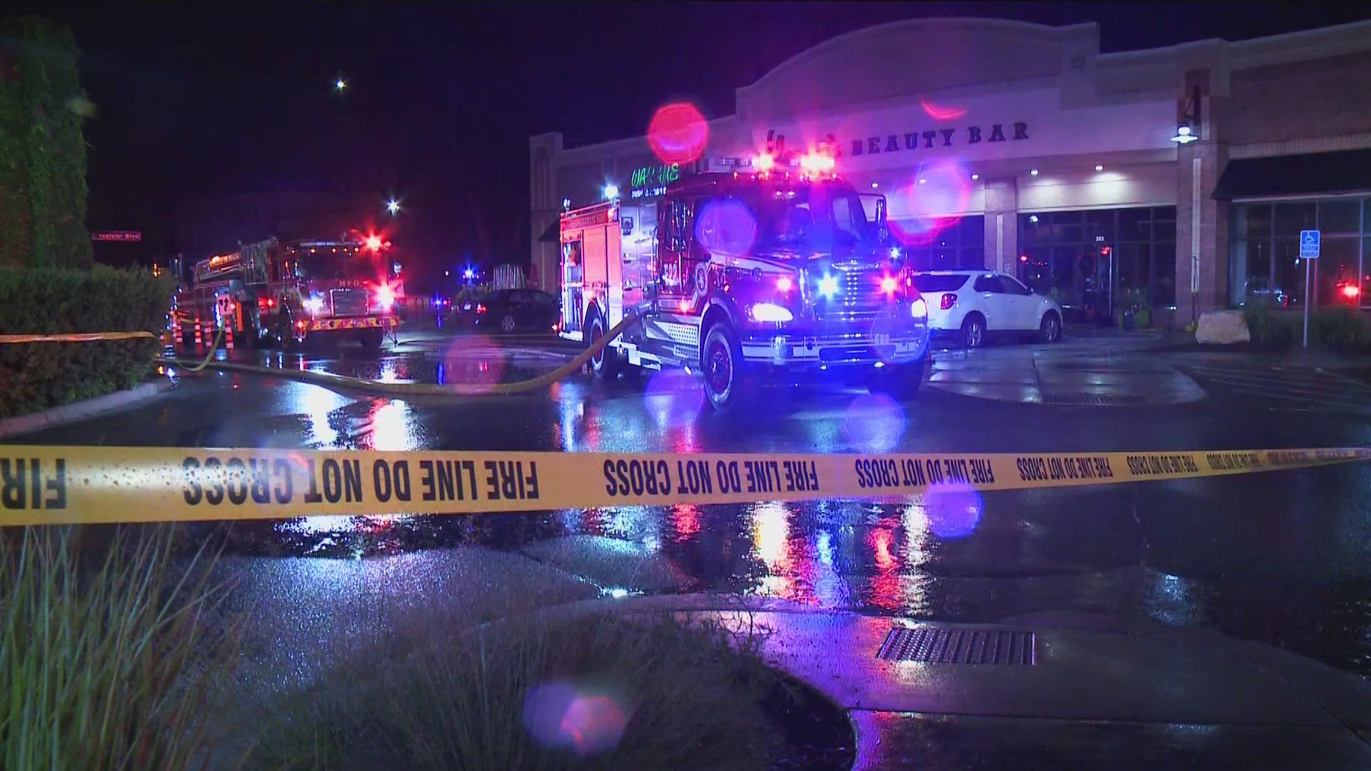 The smoke from Sloane's Beauty Bar spread to other businesses in the strip mall Tuesday night. 