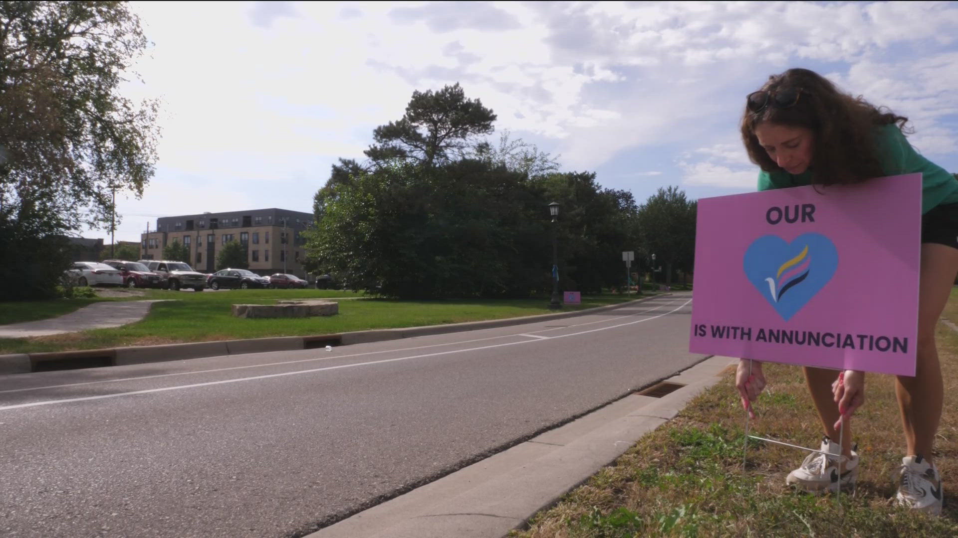 Kristen Lyrek wanted to make sure victims of the Annunciation are honored throughout the Twin Cities Marathon, so she extended a ribbon campaign across the river.