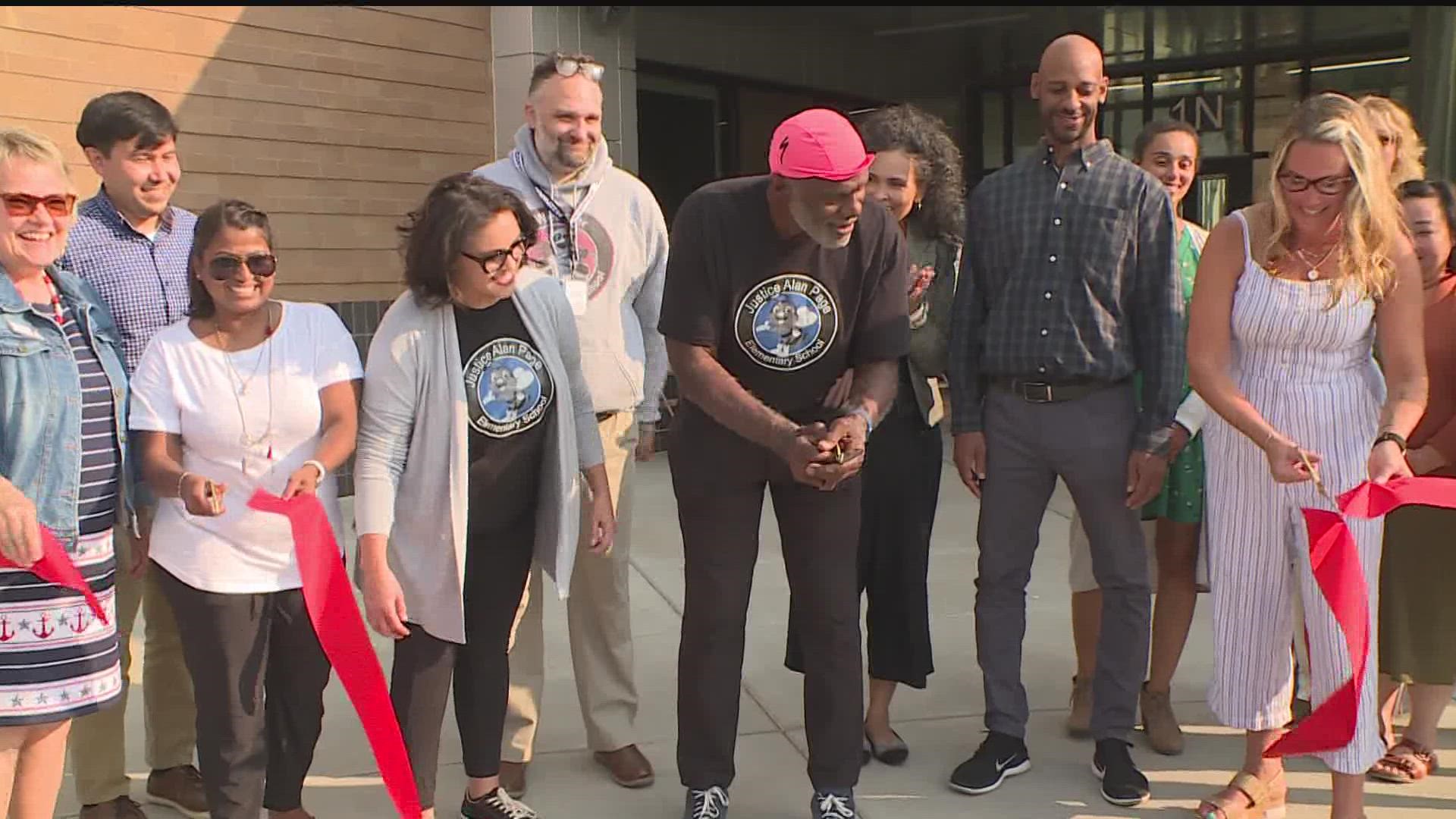 Vikings Hall of Famer and former Minnesota Supreme Court Justice Alan Page was on hand to cut the ribbon and tour the school.