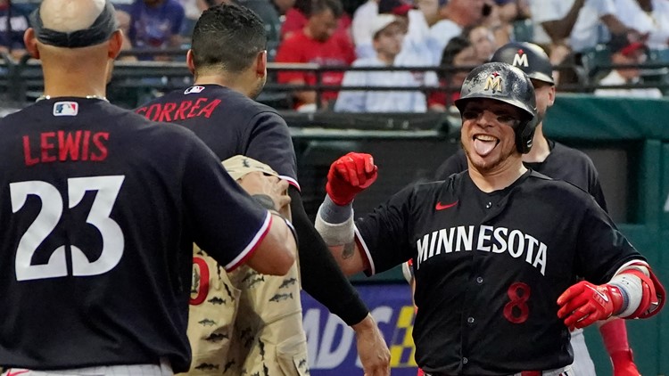 Watch: Carlos Correa tries on his new uniform & looks ready to take on AL  Central