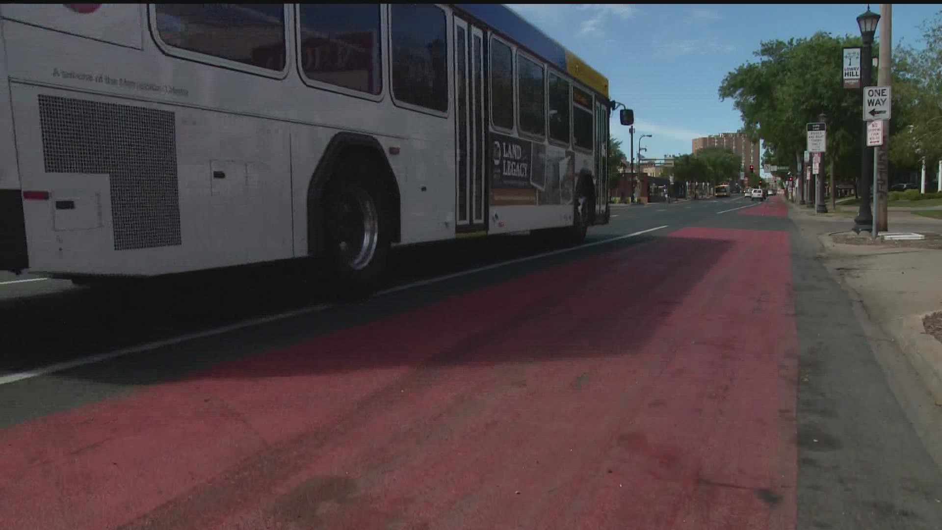 Council members are pushing for full-time bus lanes, but Mayor Frey vetoed a proposal over concerns about businesses losing parking.