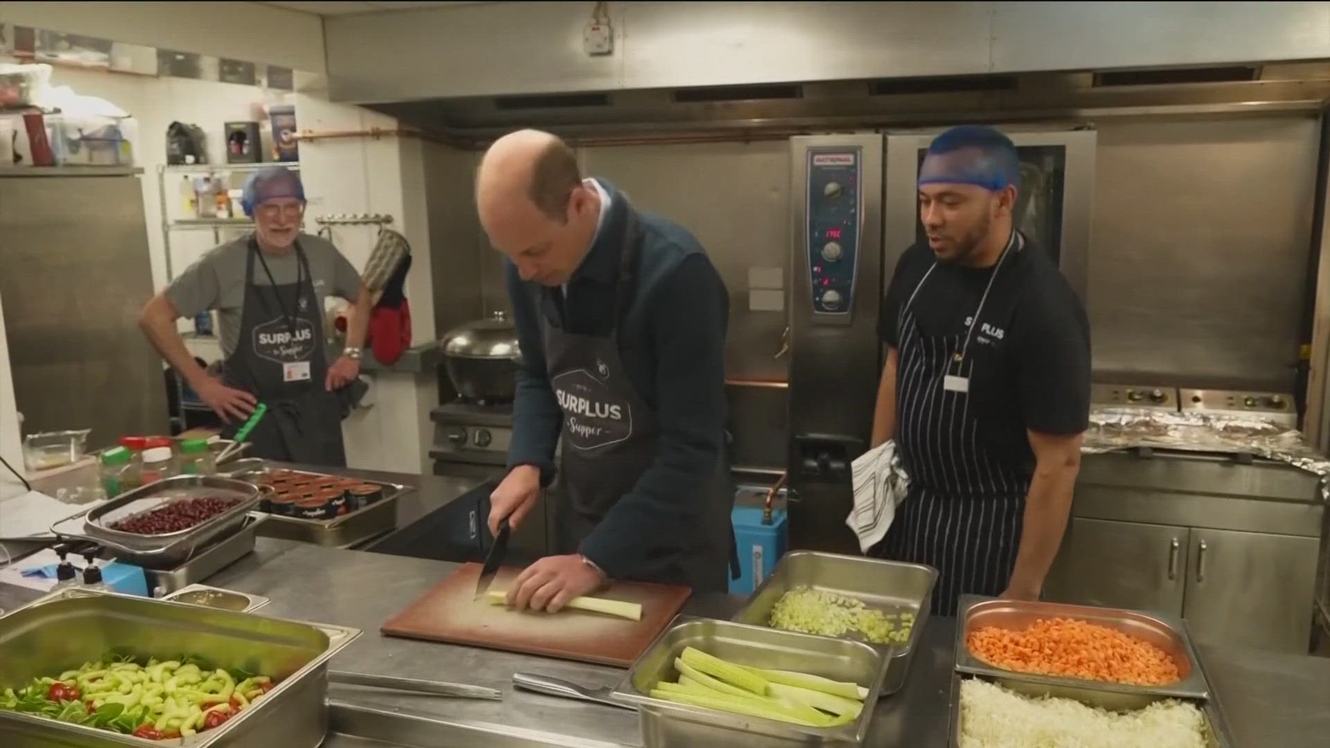 Prince William returned to his public duties Thursday, helping out a kitchen at a food distribution center in London.