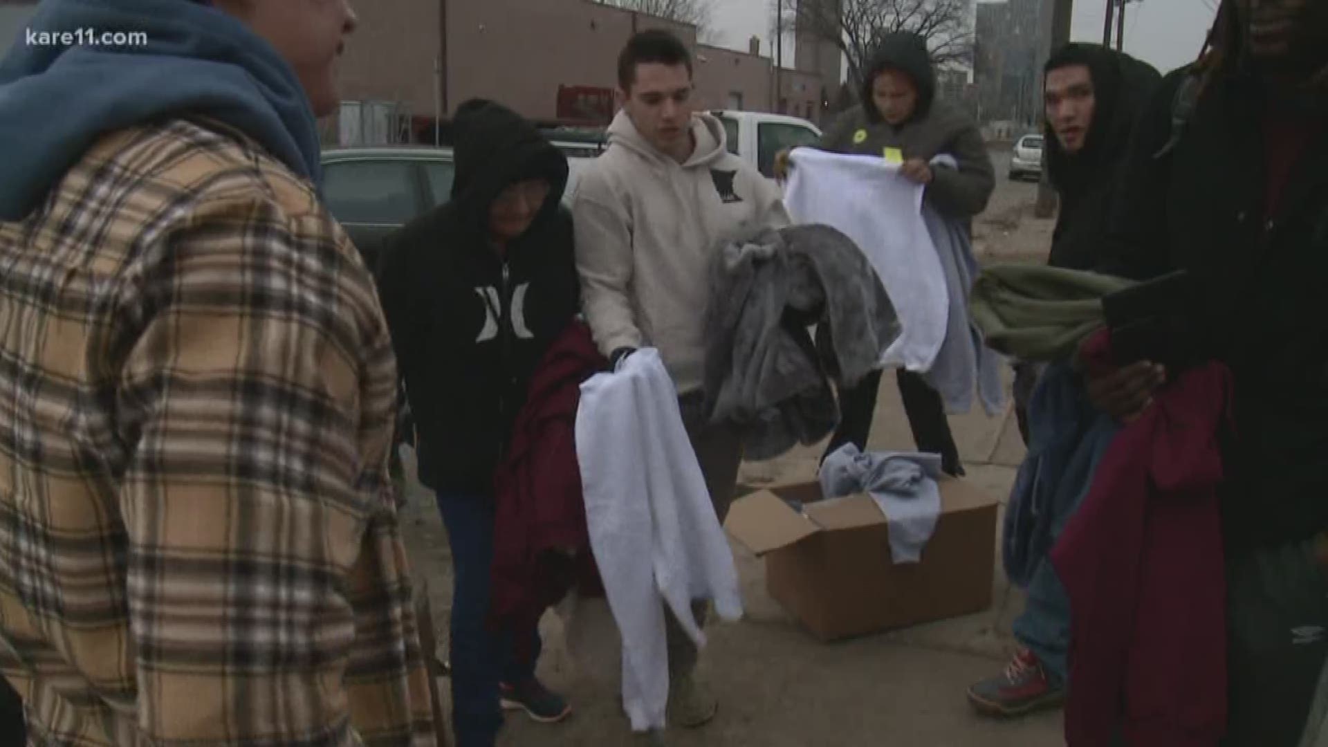 Local business passes out hoodies at Mpls. homeless camp | kare11.com