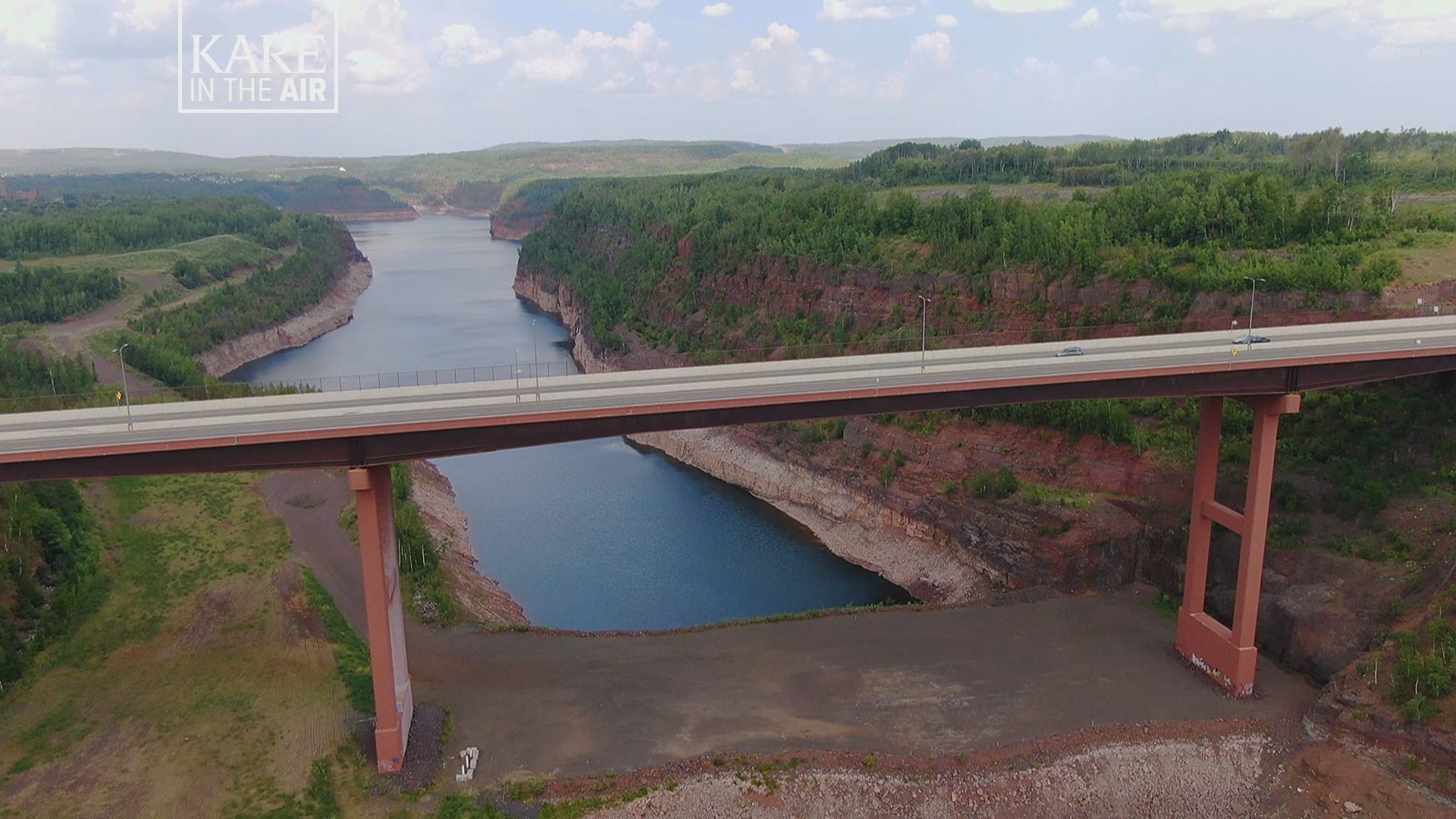 The Thomas Rukavina Memorial Bridge towers 204 feet in the air, spanning a water-filled mine pit near Virginia.