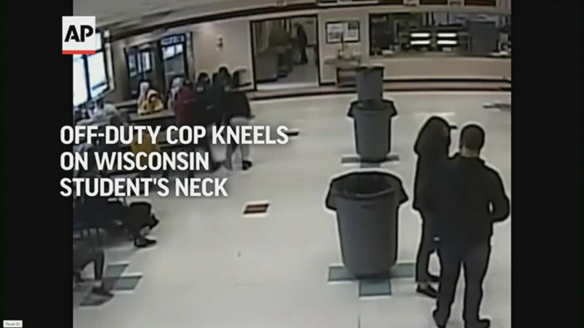 School officials in Kenosha released surveillance footage that shows an off-duty police officer putting his knee on a 12-year-old girl's neck to restrain her.