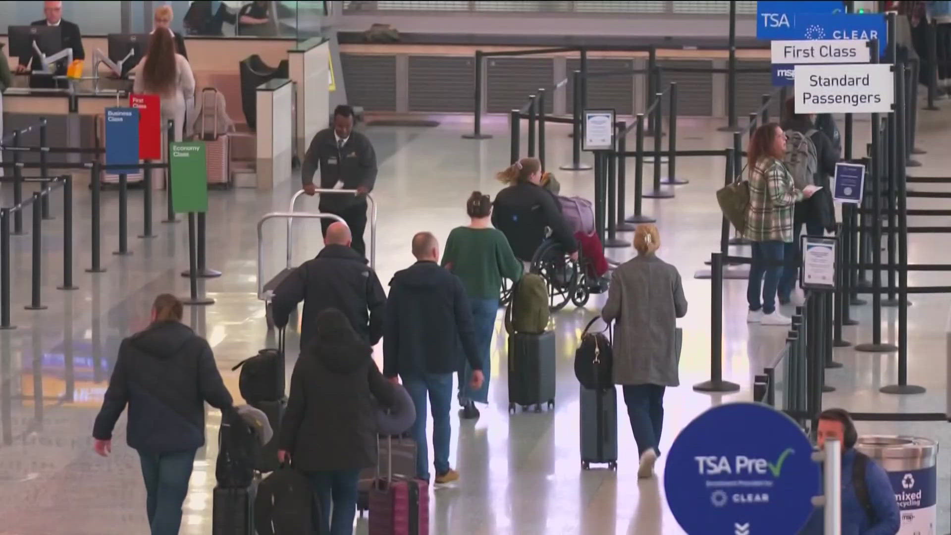 MSP Airport is bustling on Tuesday as residents head to warmer places or to visit family.