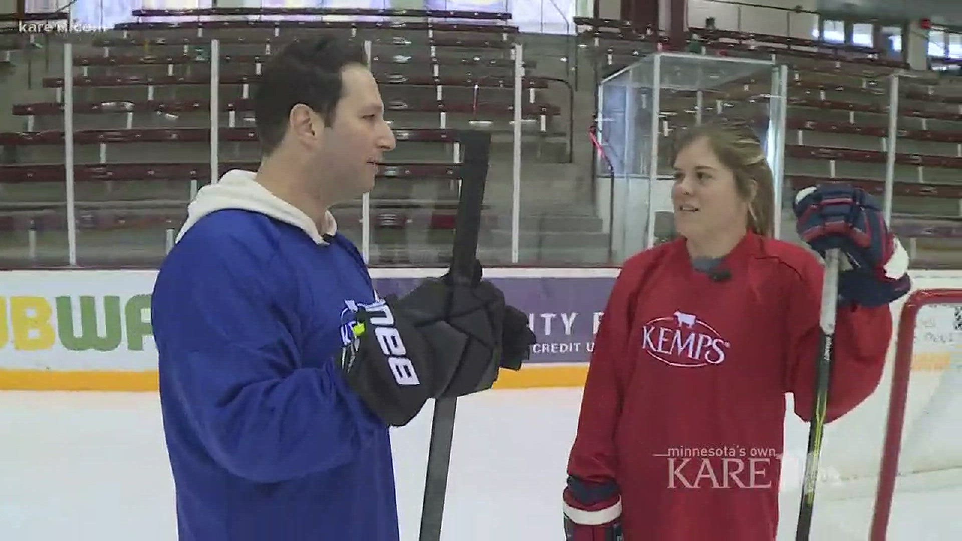 Dave tries to show off his hockey skills while playing against former University of Minnesota player Hannah Brandt as she prepares for her first Olympics.