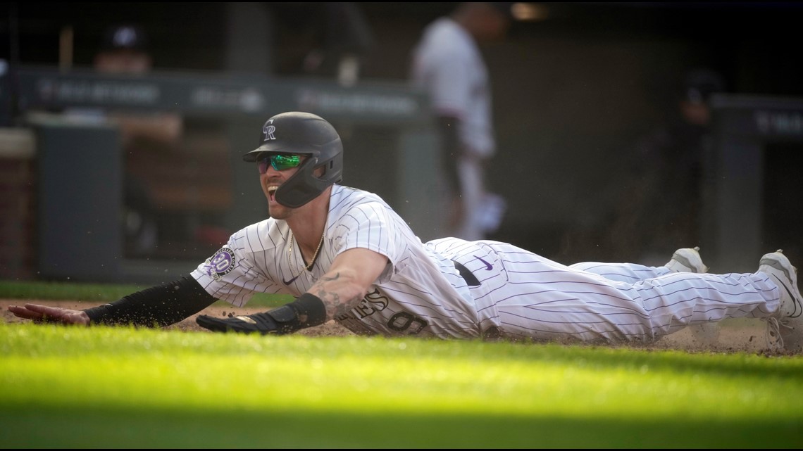 Rockies lose 3-1 pitcher's duel to Reds at Coors Field – Boulder Daily  Camera