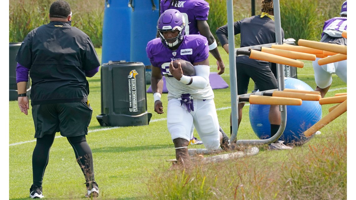 Adam Thielen of the Minnesota Vikings runs a drill during training