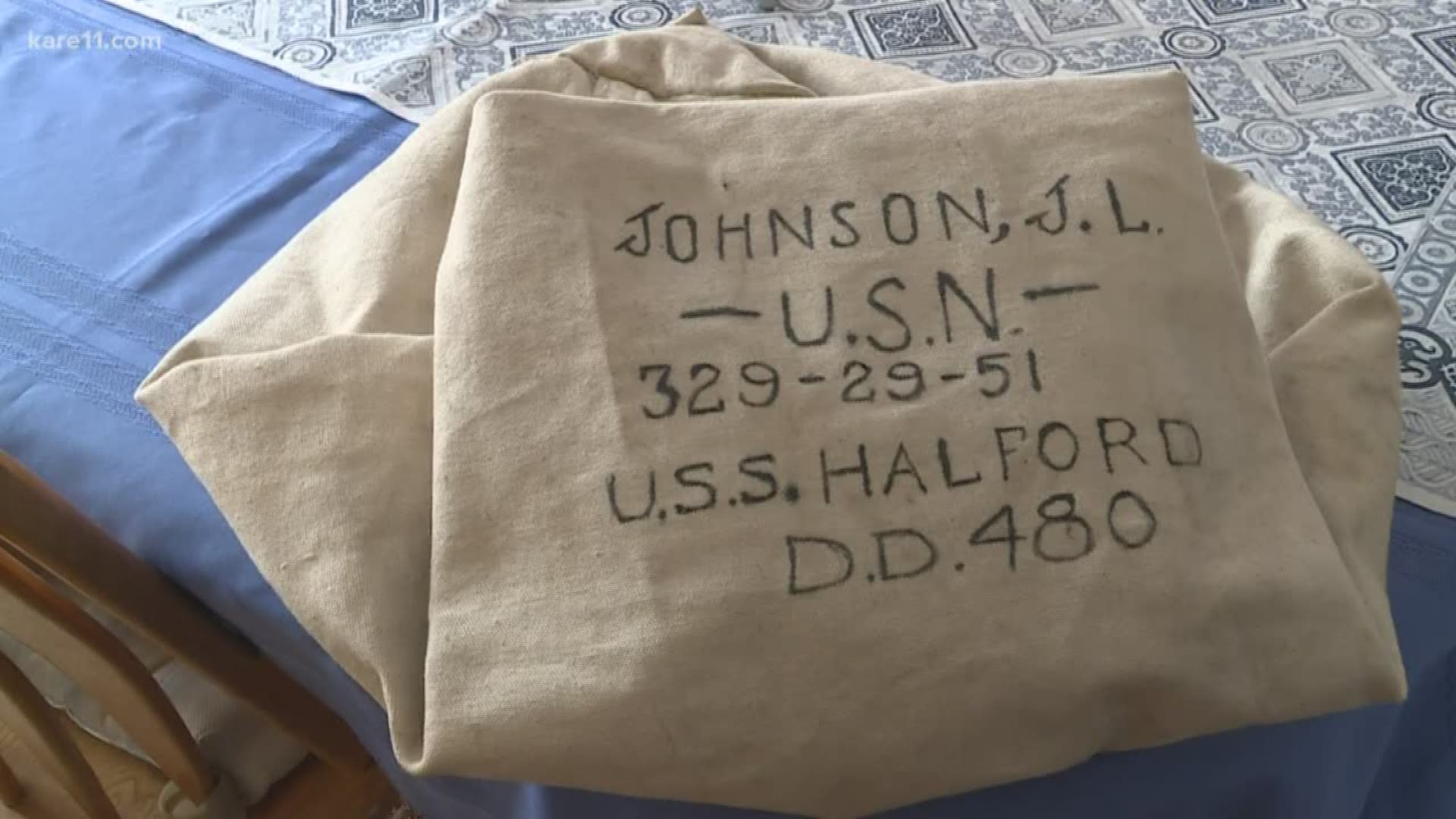 Son recognized his father's handwriting on a Navy sea bag.
