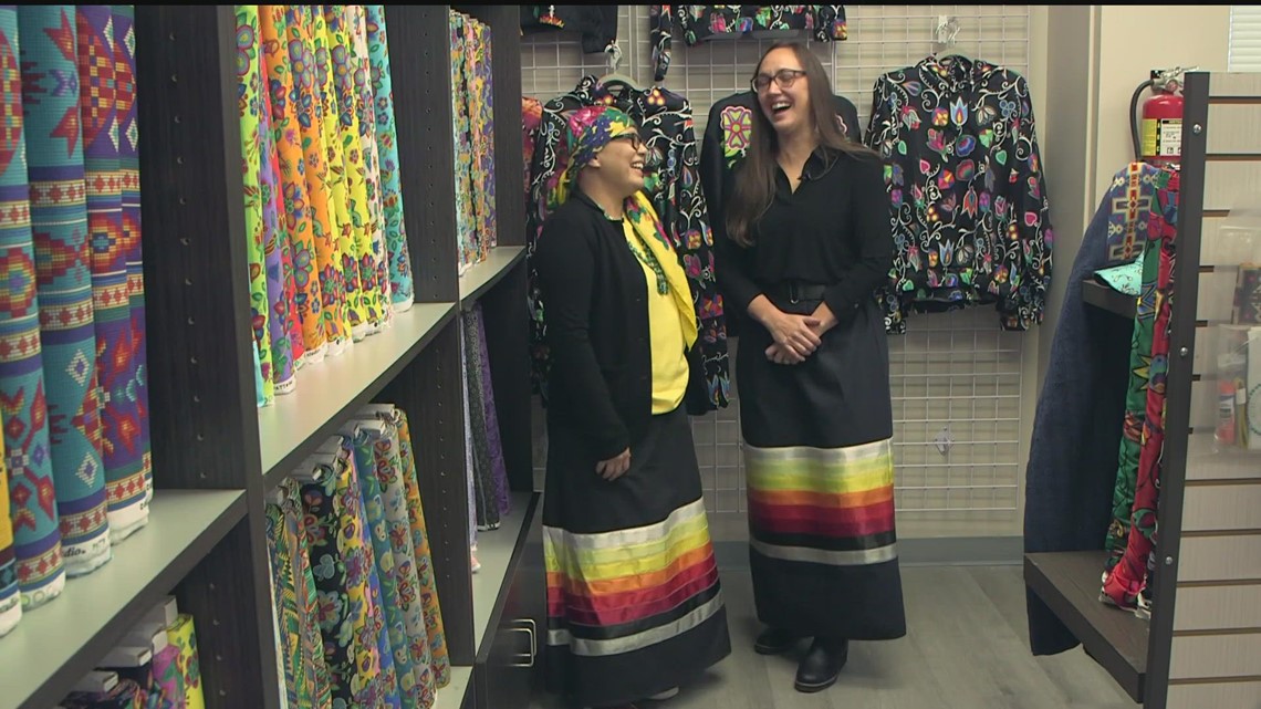 Native women open fabric store with materials for traditional clothing