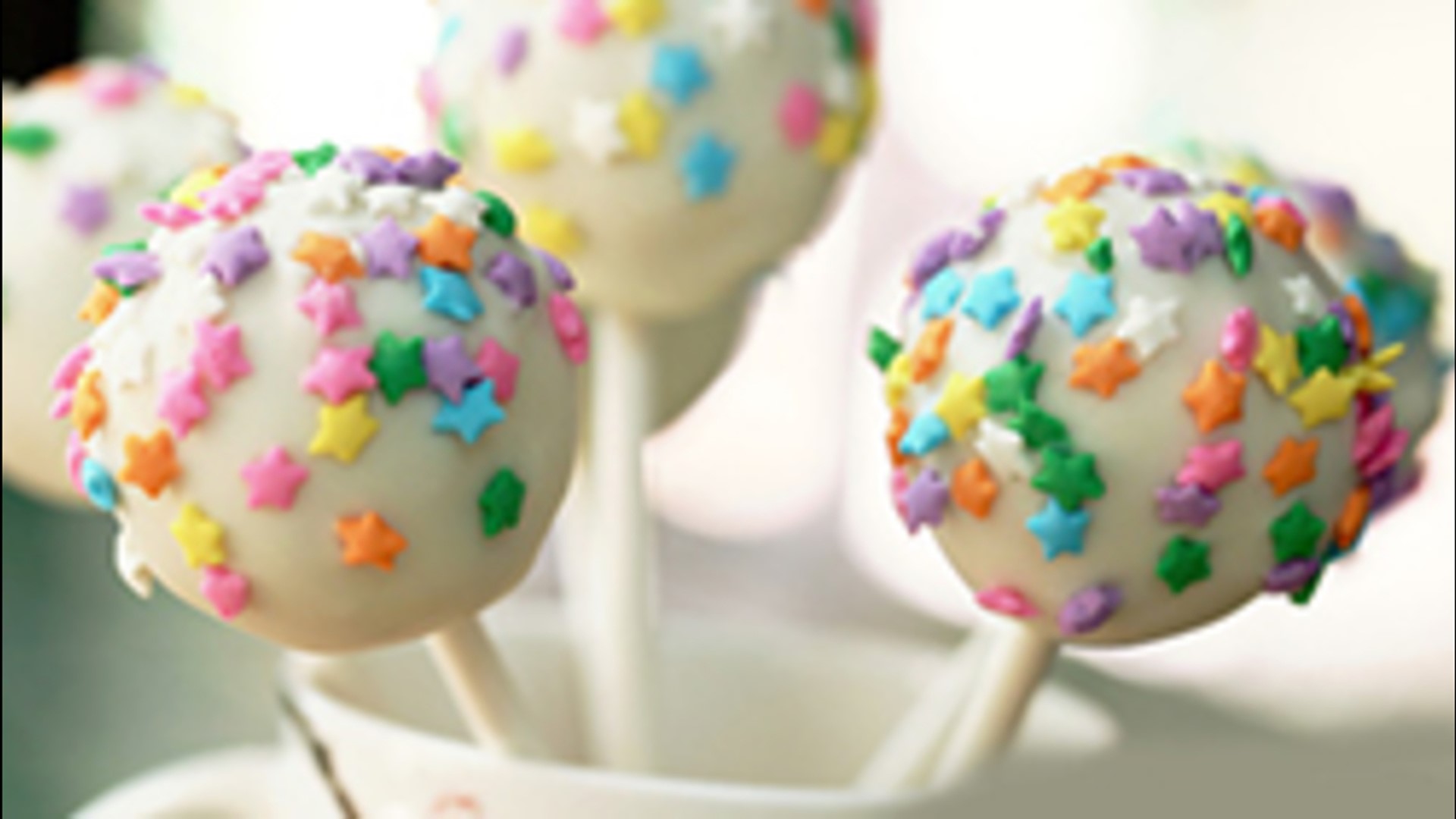 Learn how to make easy cake pops that are loaded with sprinkles and sweet icing.