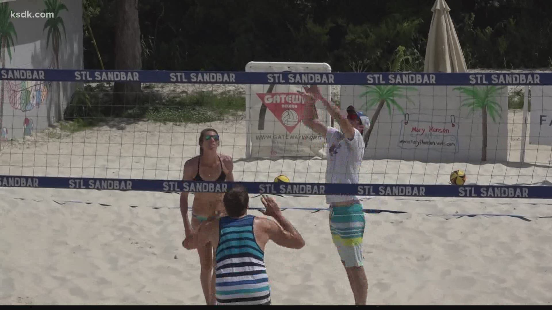 A St. Louis County couple travels around the country to play beach volleyball