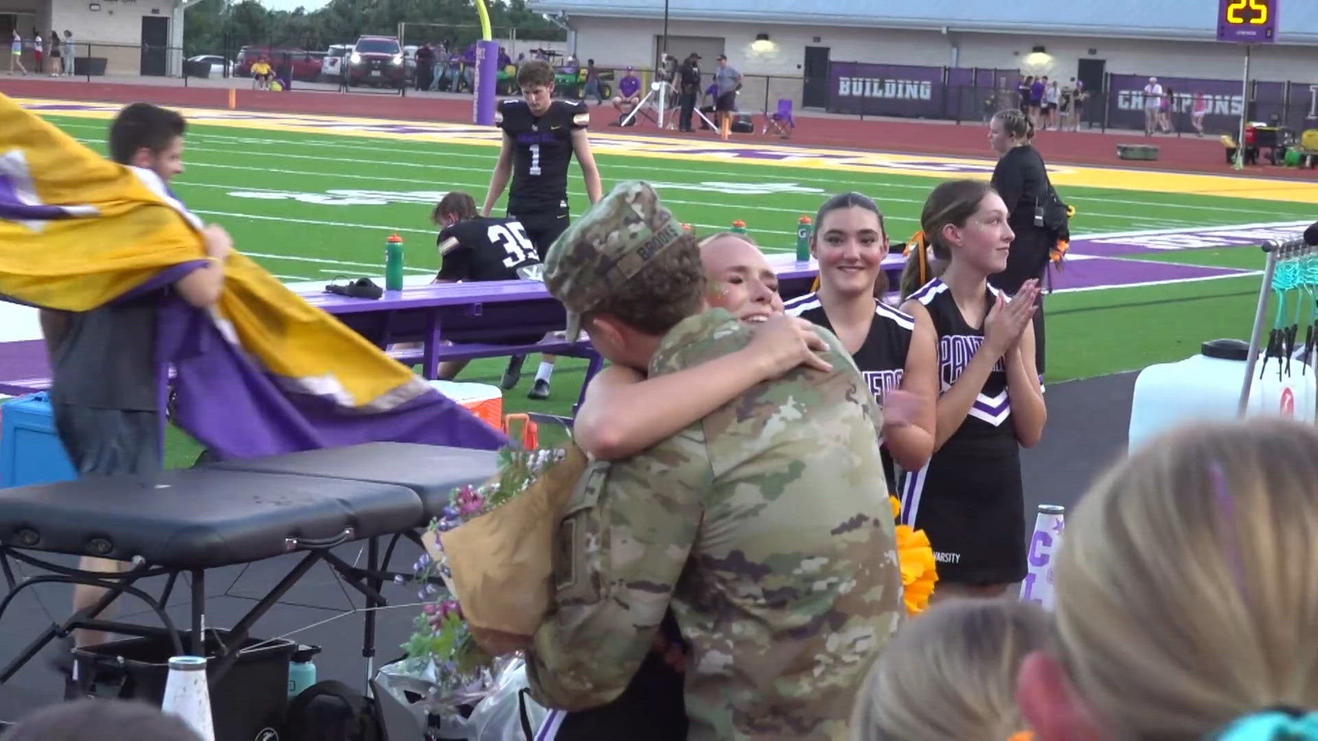 Soldier surprises sister at Texas high school football game after 16 months apart