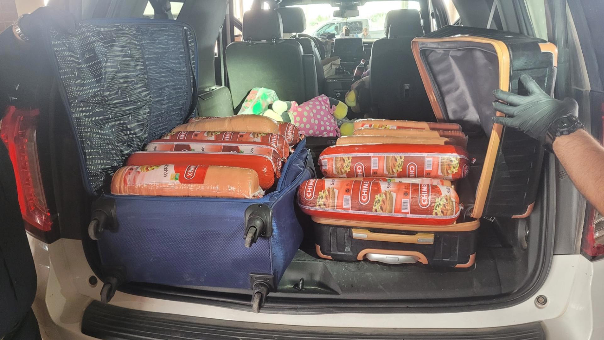 A woman was caught trying to smuggle a massive amount of bologna and prescription drugs into Texas.