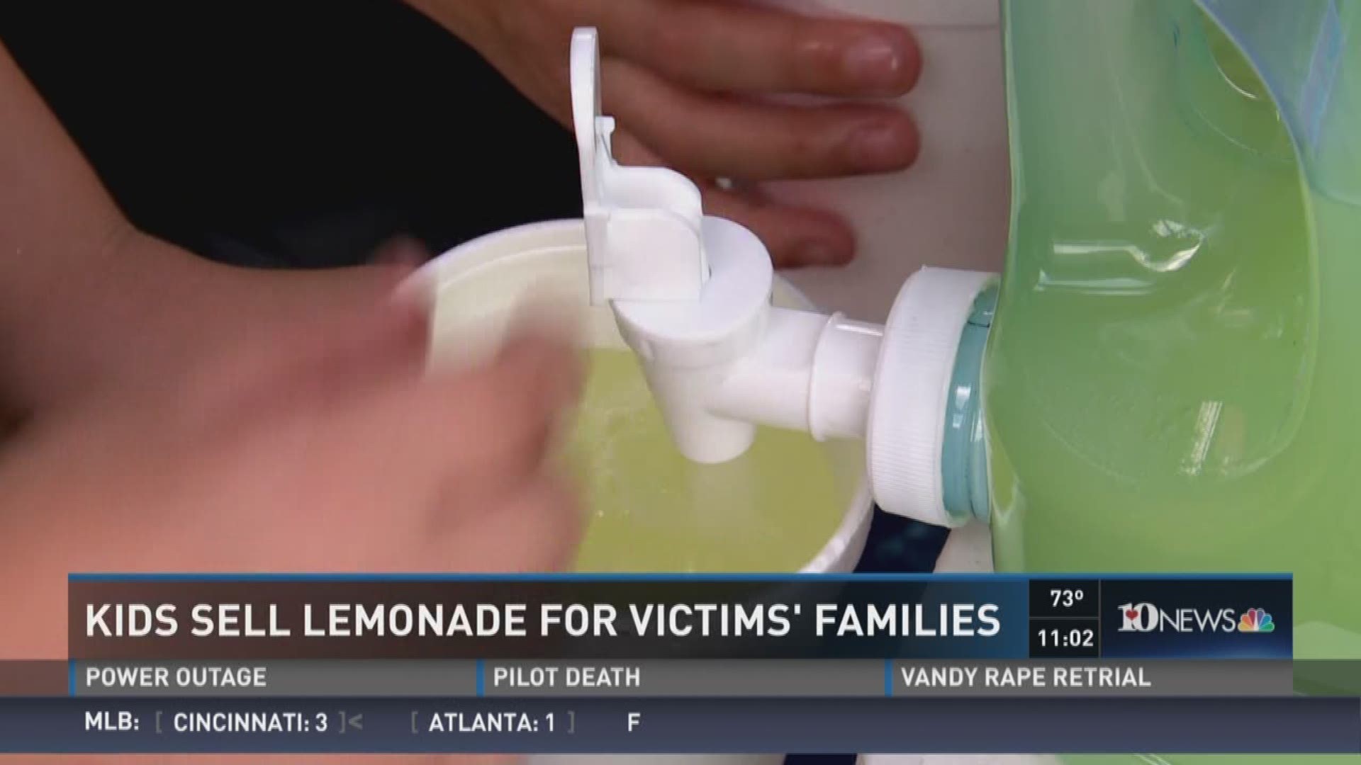 10News reporter Michael Crowe reports from Orlando, Fla. One family there is selling lemonade to help the families of the shooting victims, just down the road from Pulse nightclub. (6/14/16)