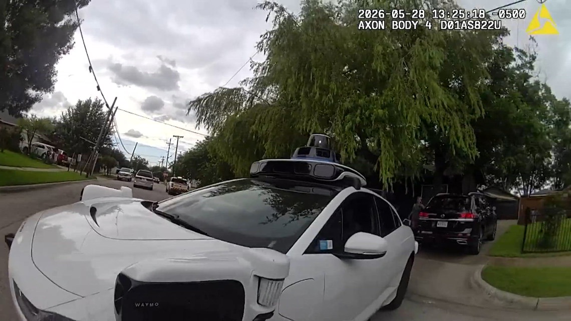 VIDEO: Waymo vehicle blocks first responders on road following Texas apartment explosion