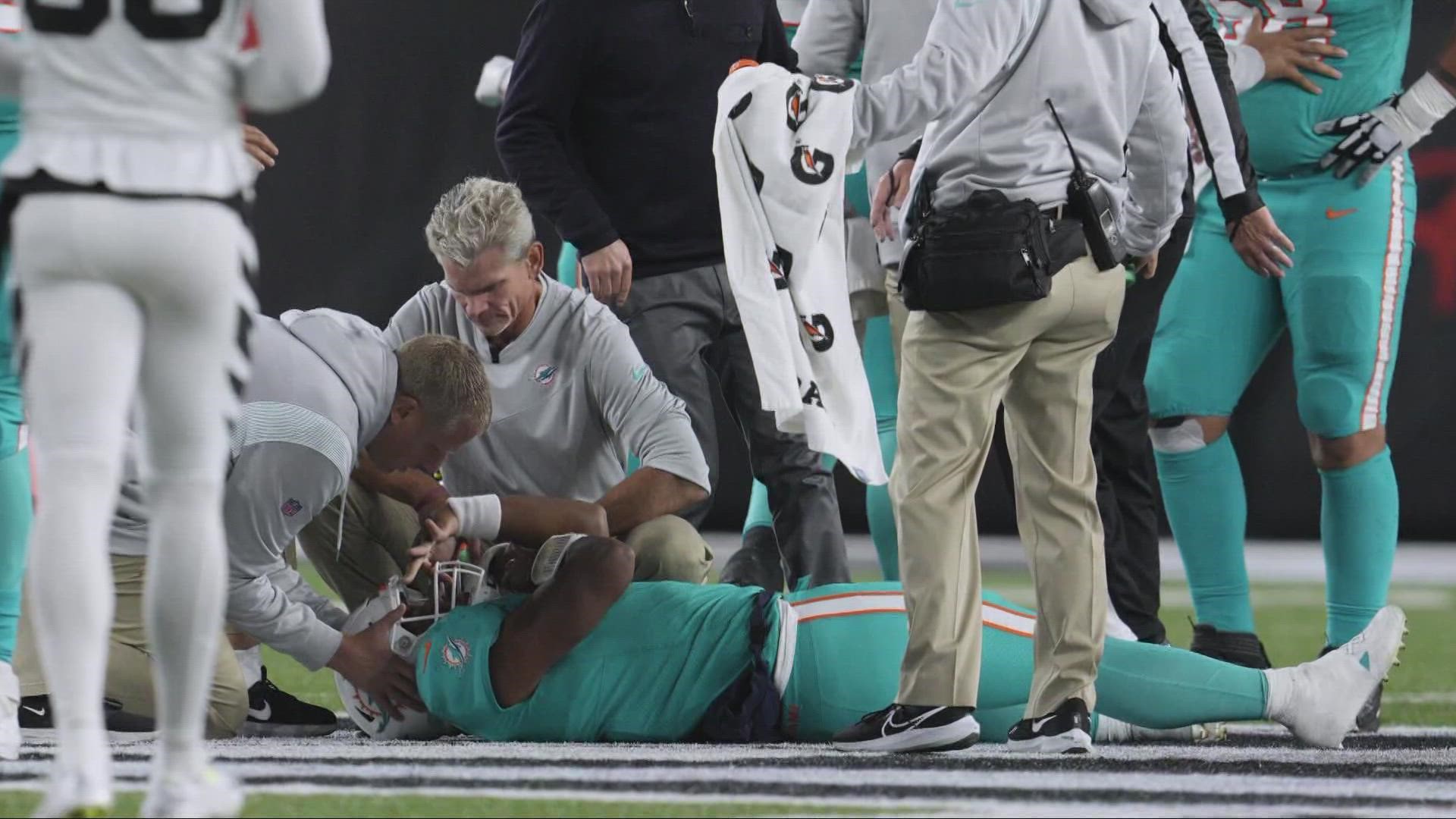 The Miami Dolphins quarterback took a hard hit and remained down for more than seven minutes before being taken off the field on a stretcher.