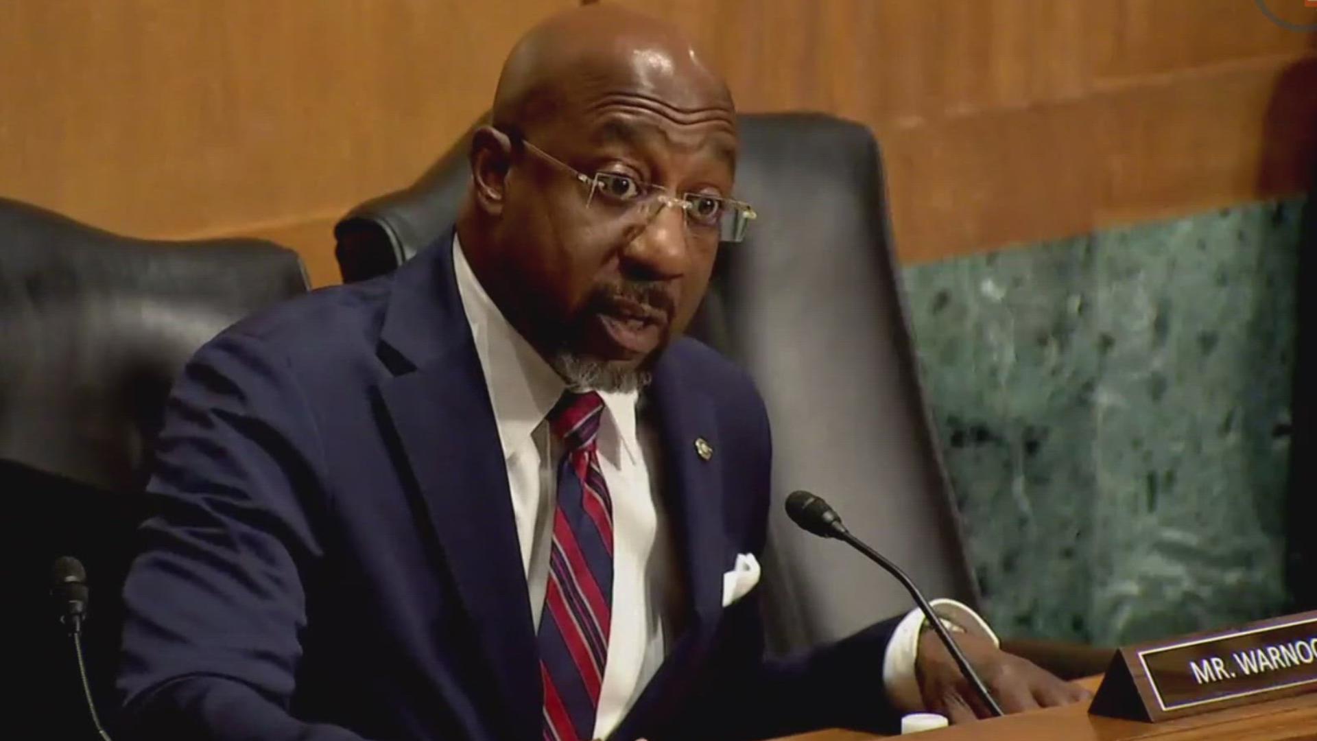 Sen. Raphael Warnock and HHS Sec. Robert F. Kennedy Jr. verbally sparred during the Senate Finance Committee on Thursday.